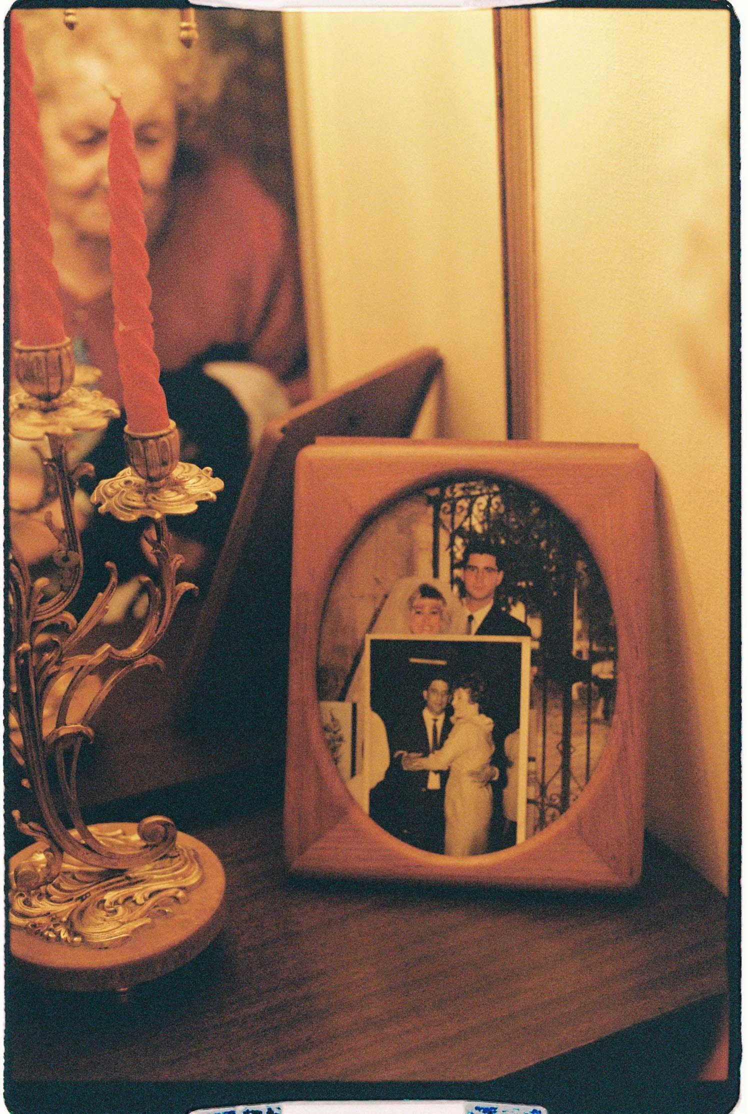 frame with old photographs of family weddings