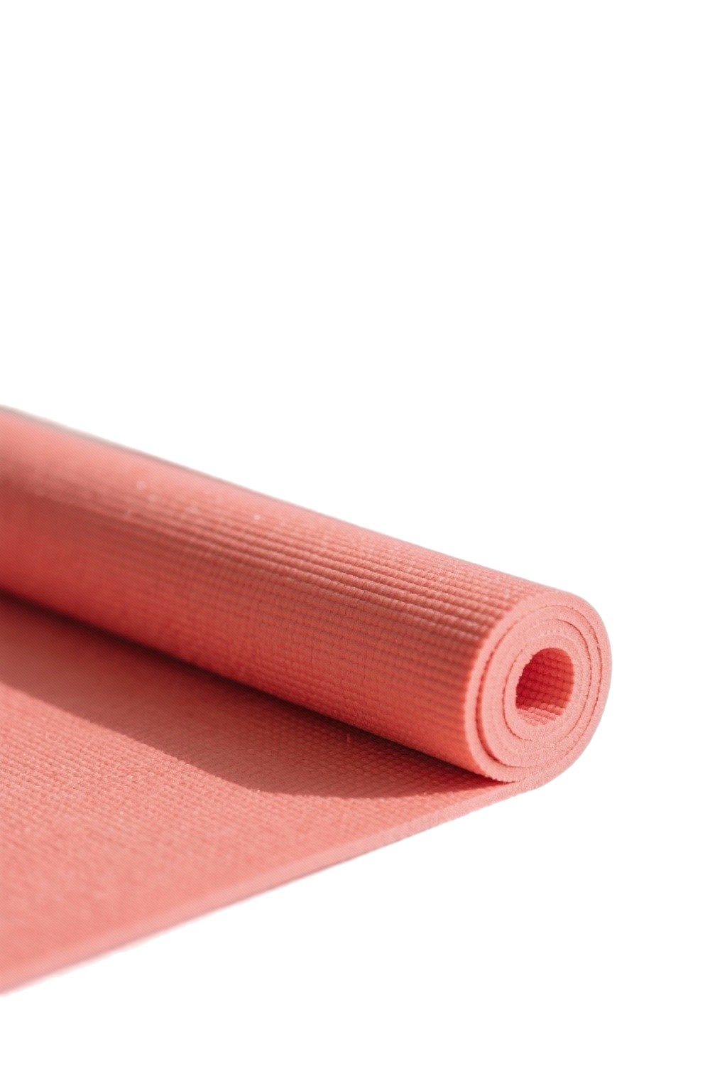 Pink rolled yoga mat on a pink surface.