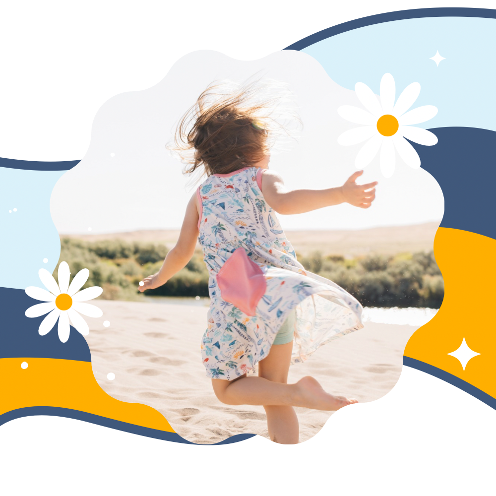 girl in tank dress with beach scenes on it