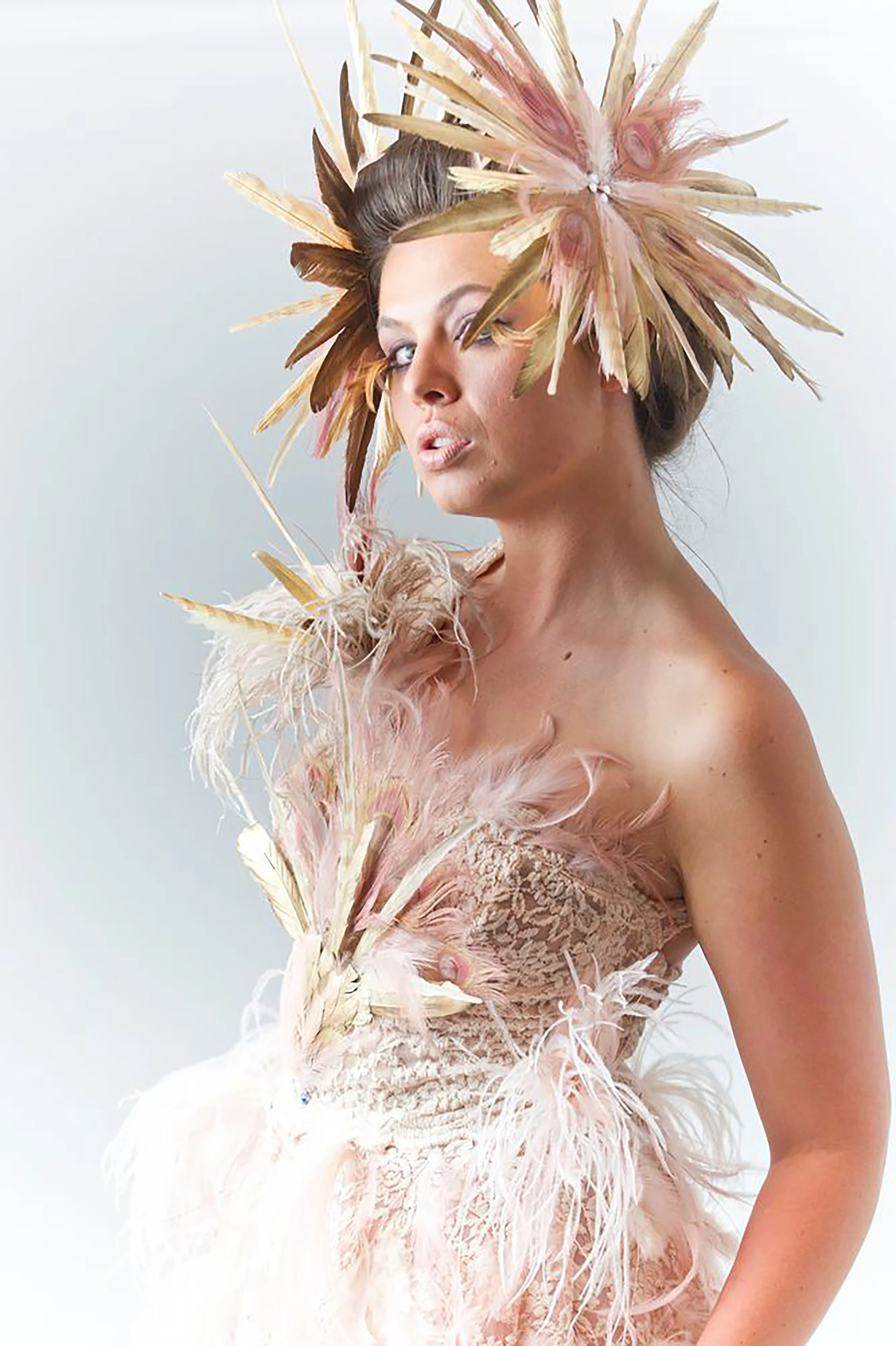 Headpiece made from headband covered with leather, bleached peacock feathers, Pheasant and coque feathers with rhinestones