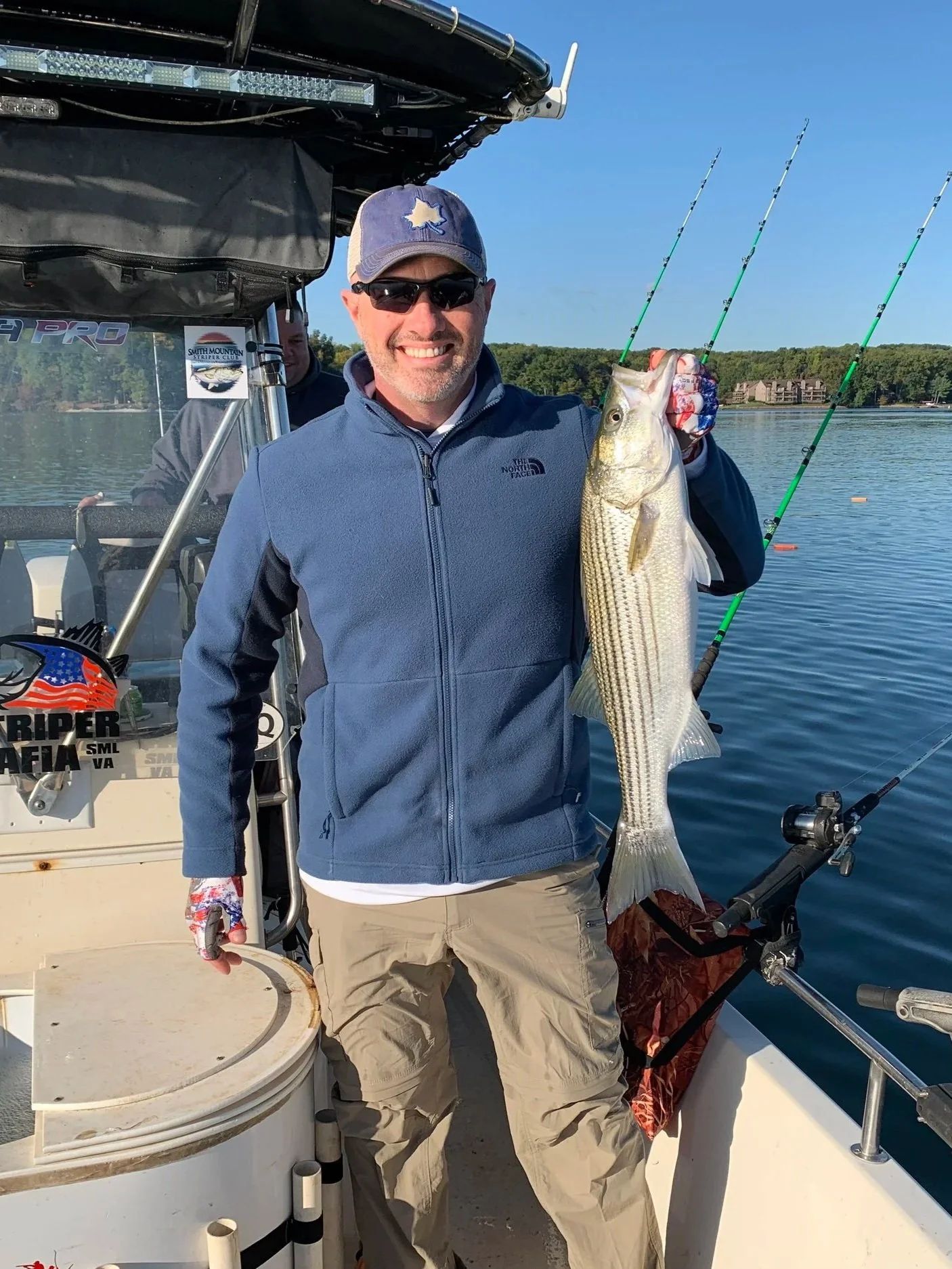 Michael May, founder of Strategic Life Coaching for Men and former Deputy Executive Director of the Tennessee Wildlife Resources Agency, fishing outdoors and reflecting executive leadership, public service, and field experience.