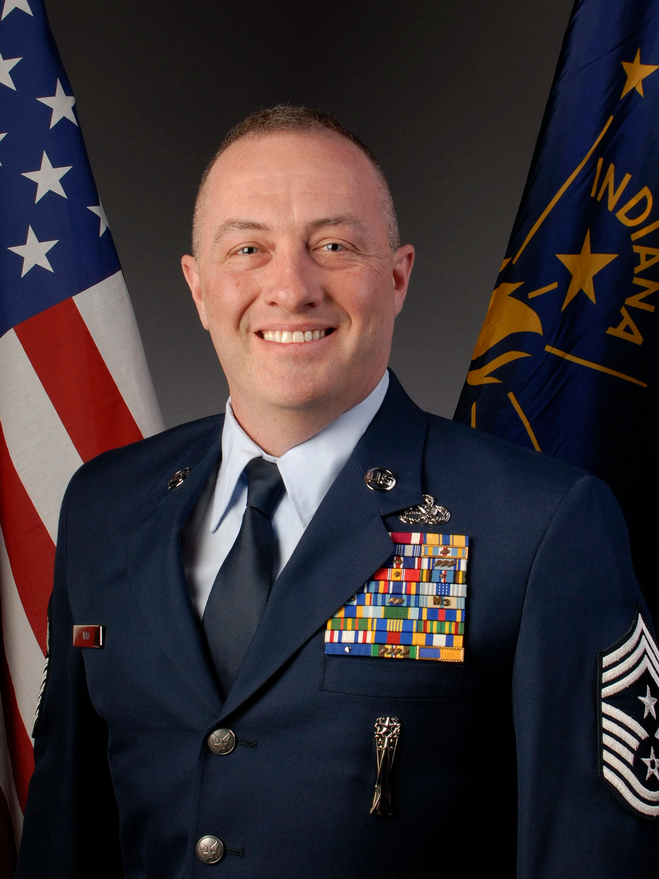 Michael May, MLCP, founder of Strategic Life Coaching for Men, shown in his formal Air Force State Command Chief portrait reflecting senior military leadership experience.