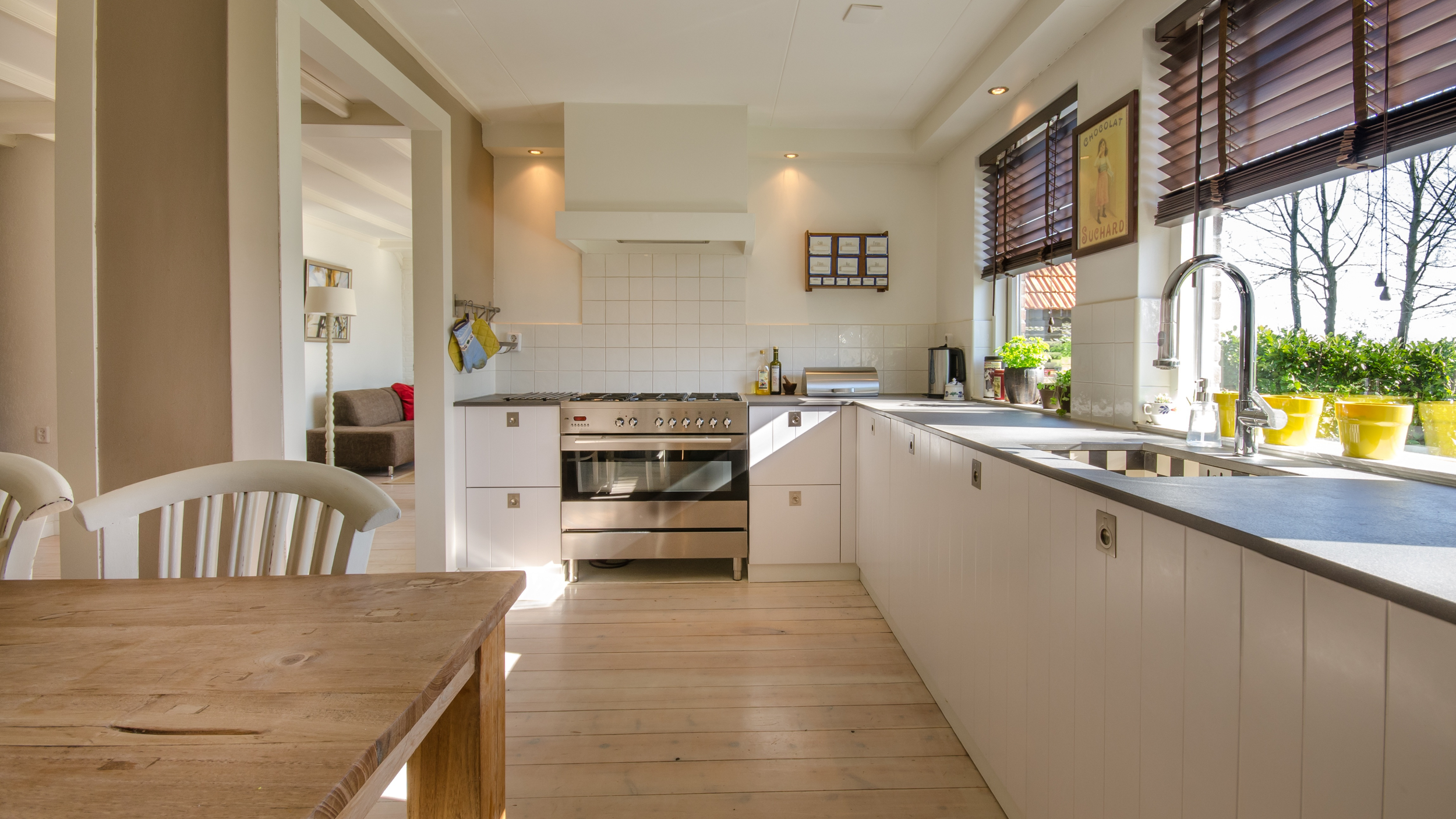 A clean house of oak and beige colors