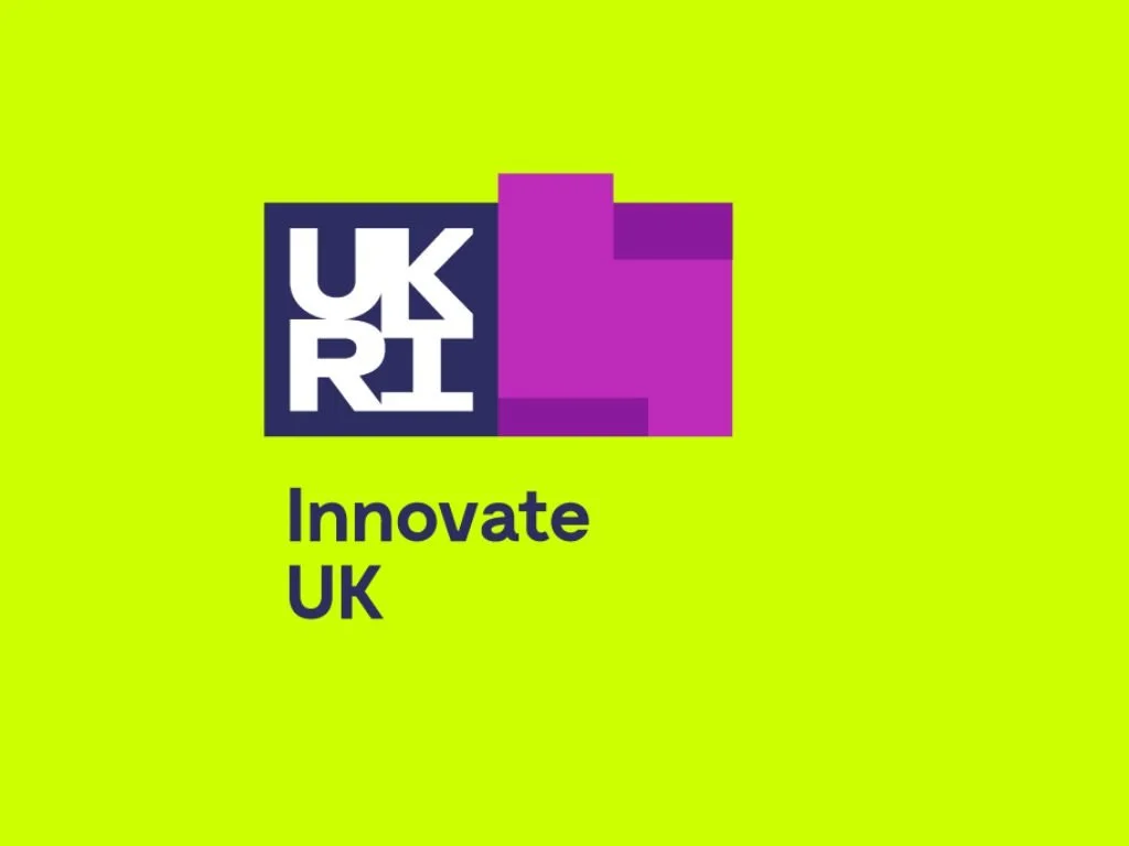 Bright green background with the UKRI logo in blue and white and a purple geometric shape. Below, text reads "Innovate UK" in black.