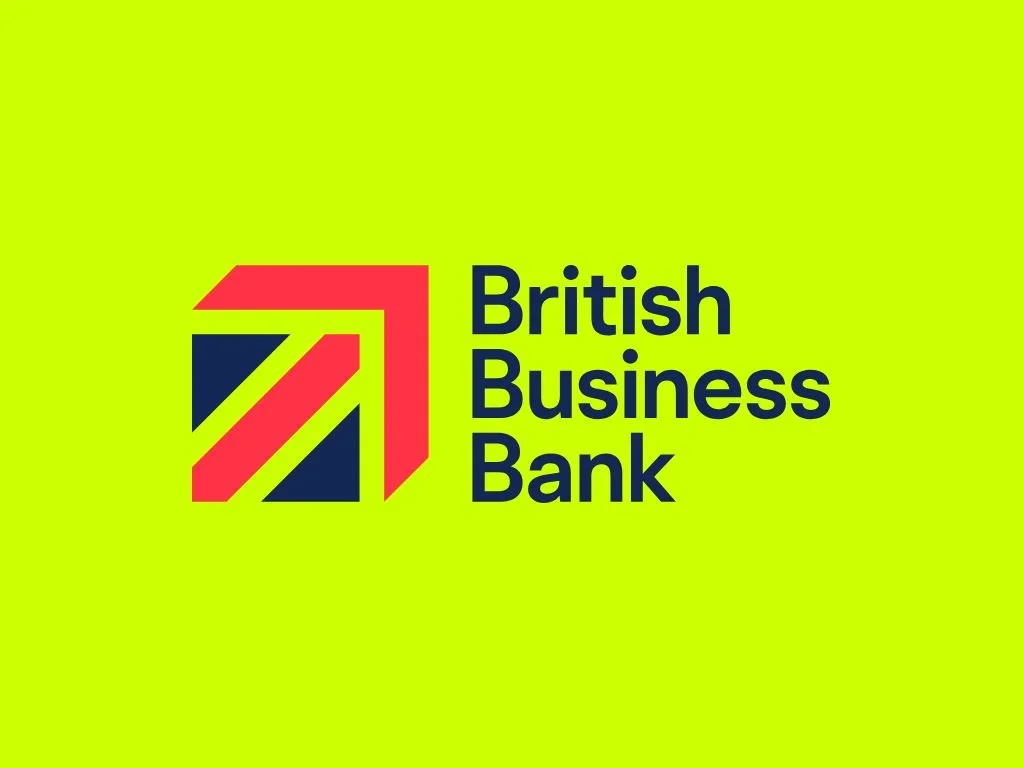 The logo of the British Business Bank featuring geometric shapes in red and dark blue and the text 'British Business Bank' in dark blue on a yellow background.