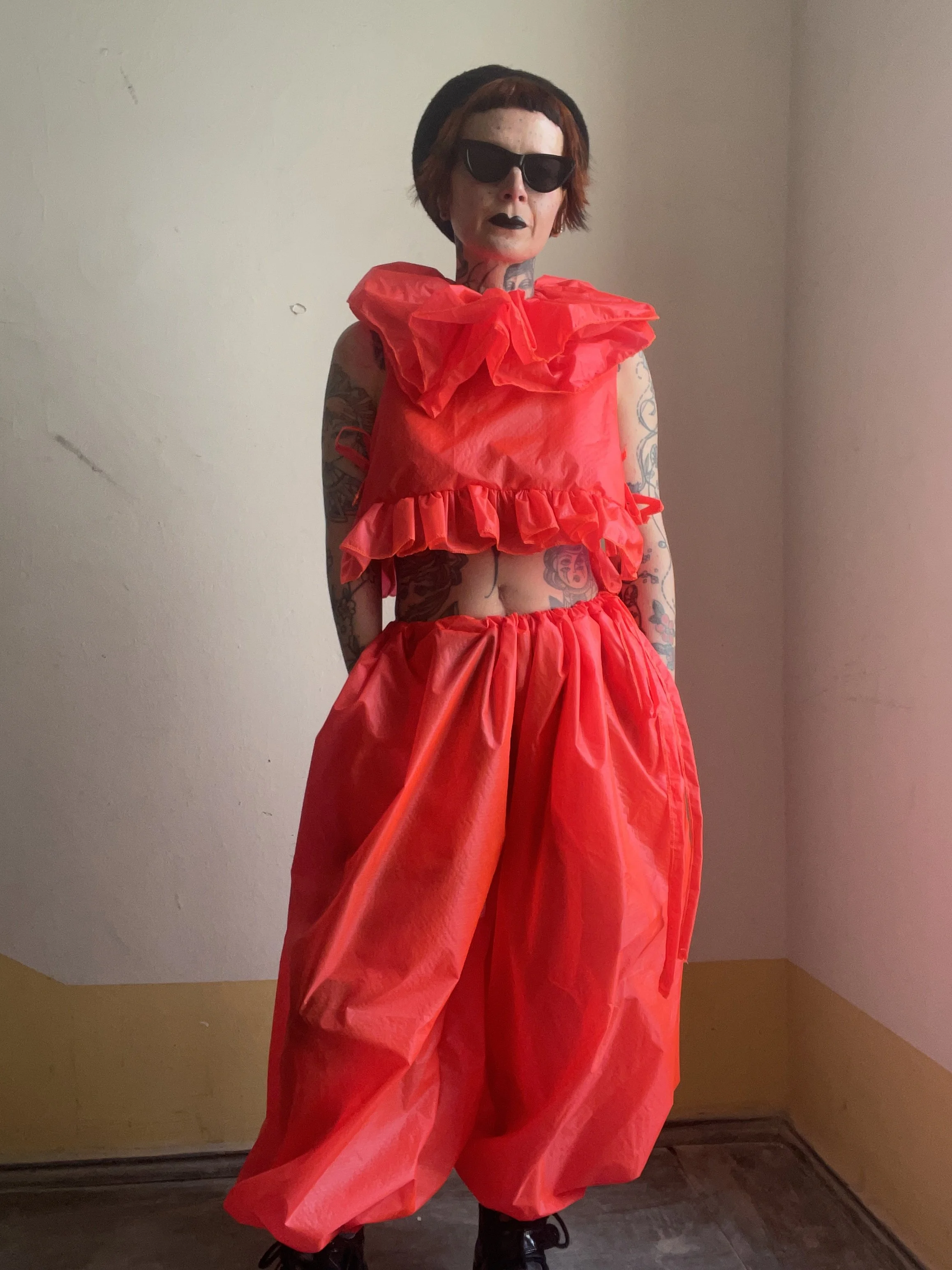 Neon orange ruffle outfit