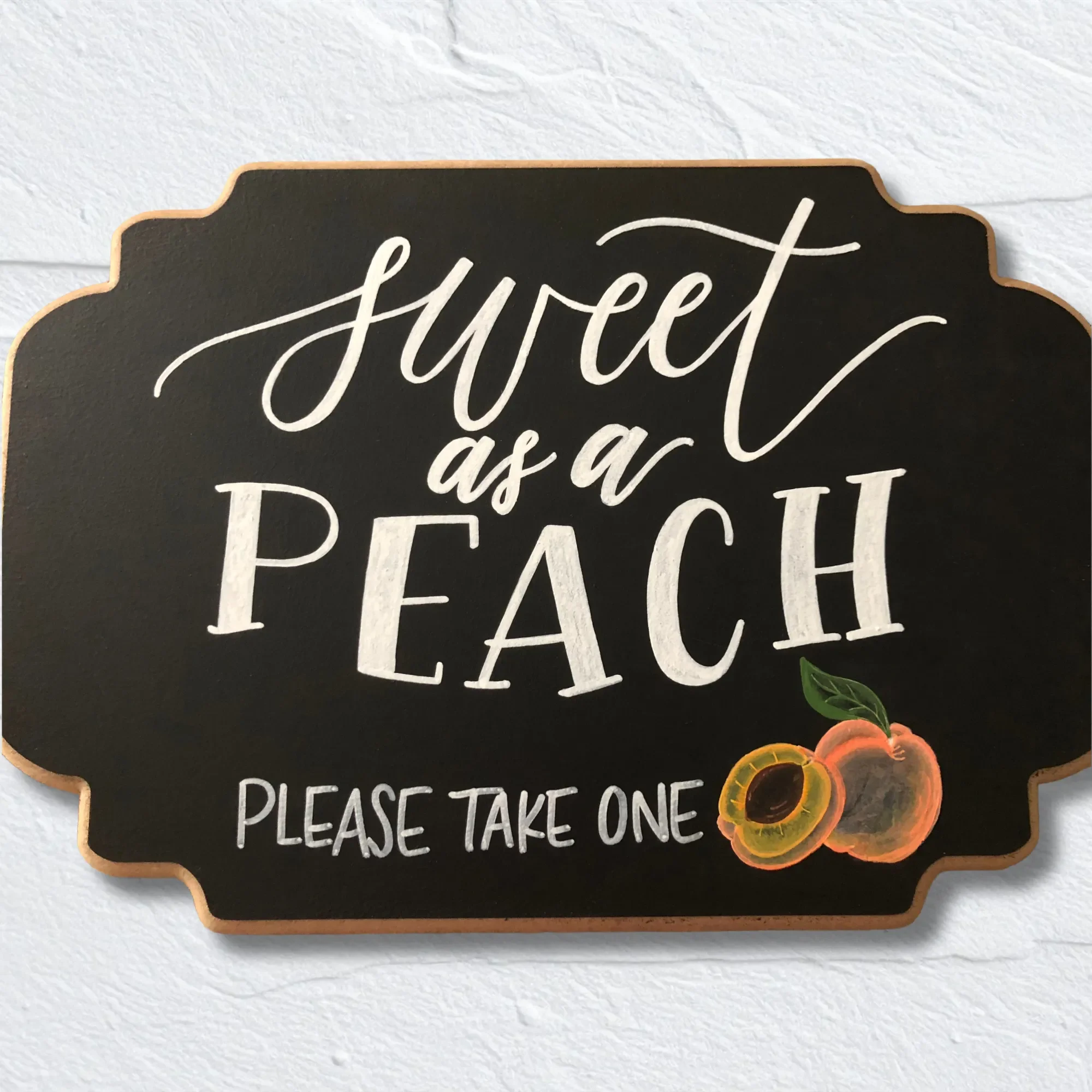 Custom Georgia wedding favor table sign featuring hand-painted botanical peach illustrations.