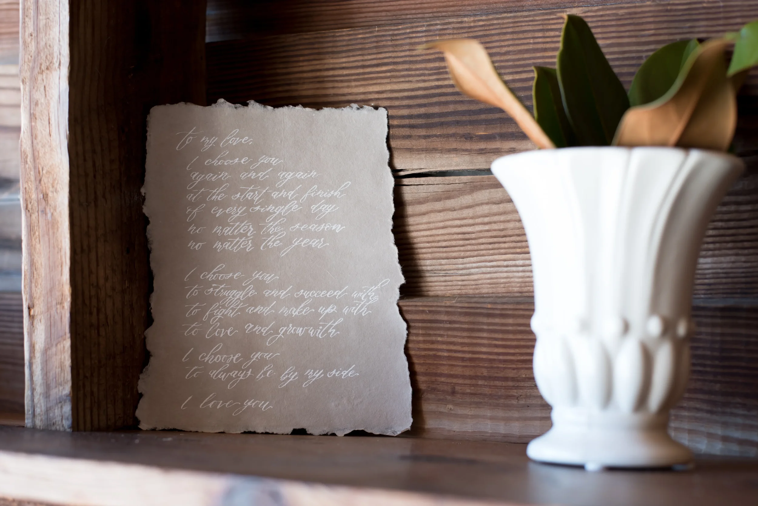 Preserve your promises forever with a custom hand-lettered wedding vow letter. Written in delicate white script on warm, sand-toned deckled-edge paper, this romantic "To My Love" vow sheet brings heirloom quality and soft texture to wedding photograp