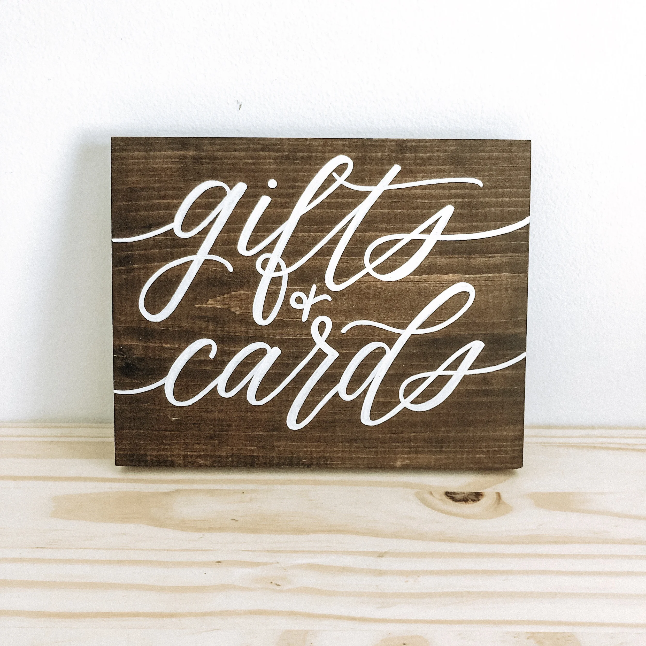 Dark stained wood block sign for gifts and cards table at wedding.