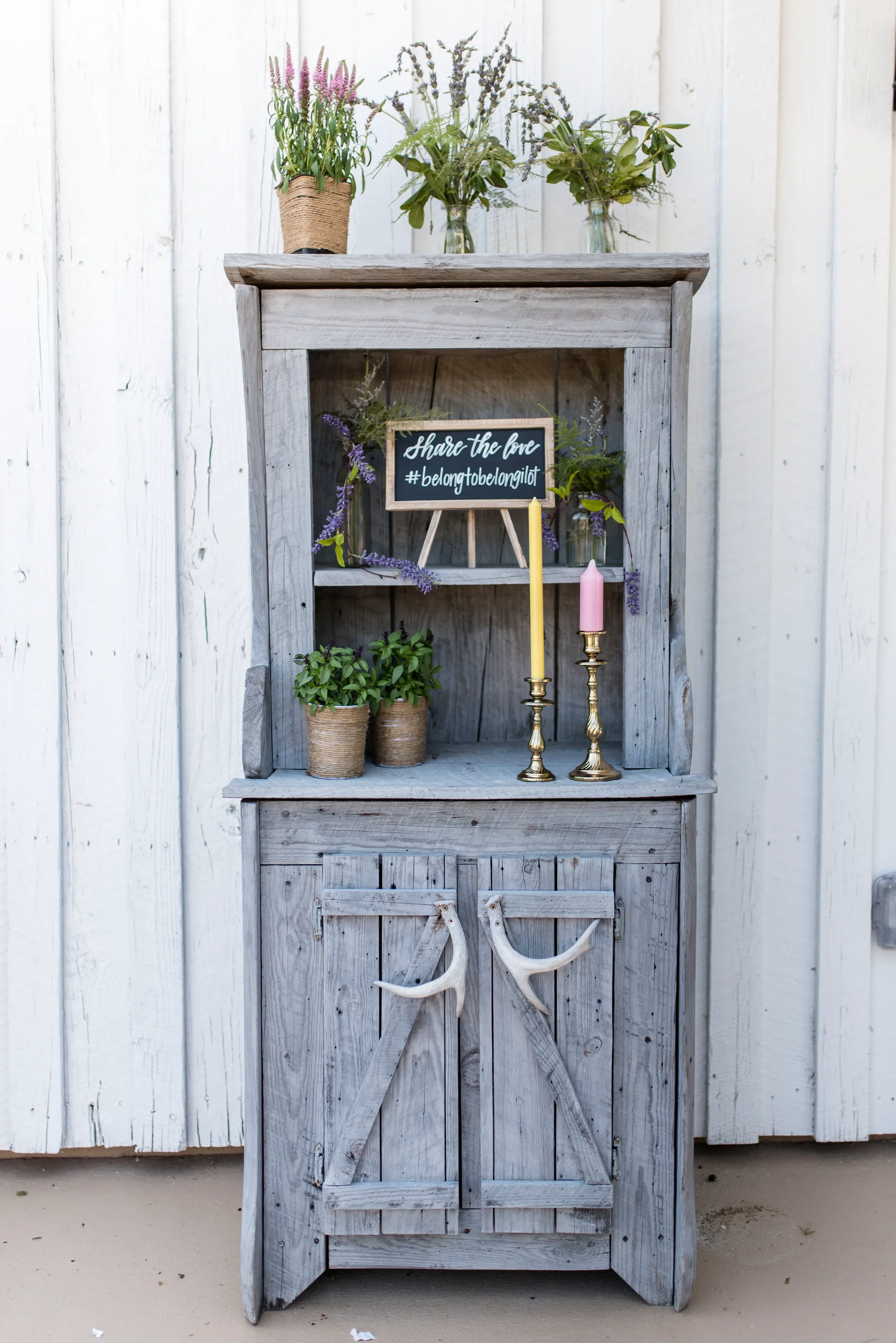 Hand-lettered hashtag chalkboard sign for a rustic outdoor wedding in Georgia.