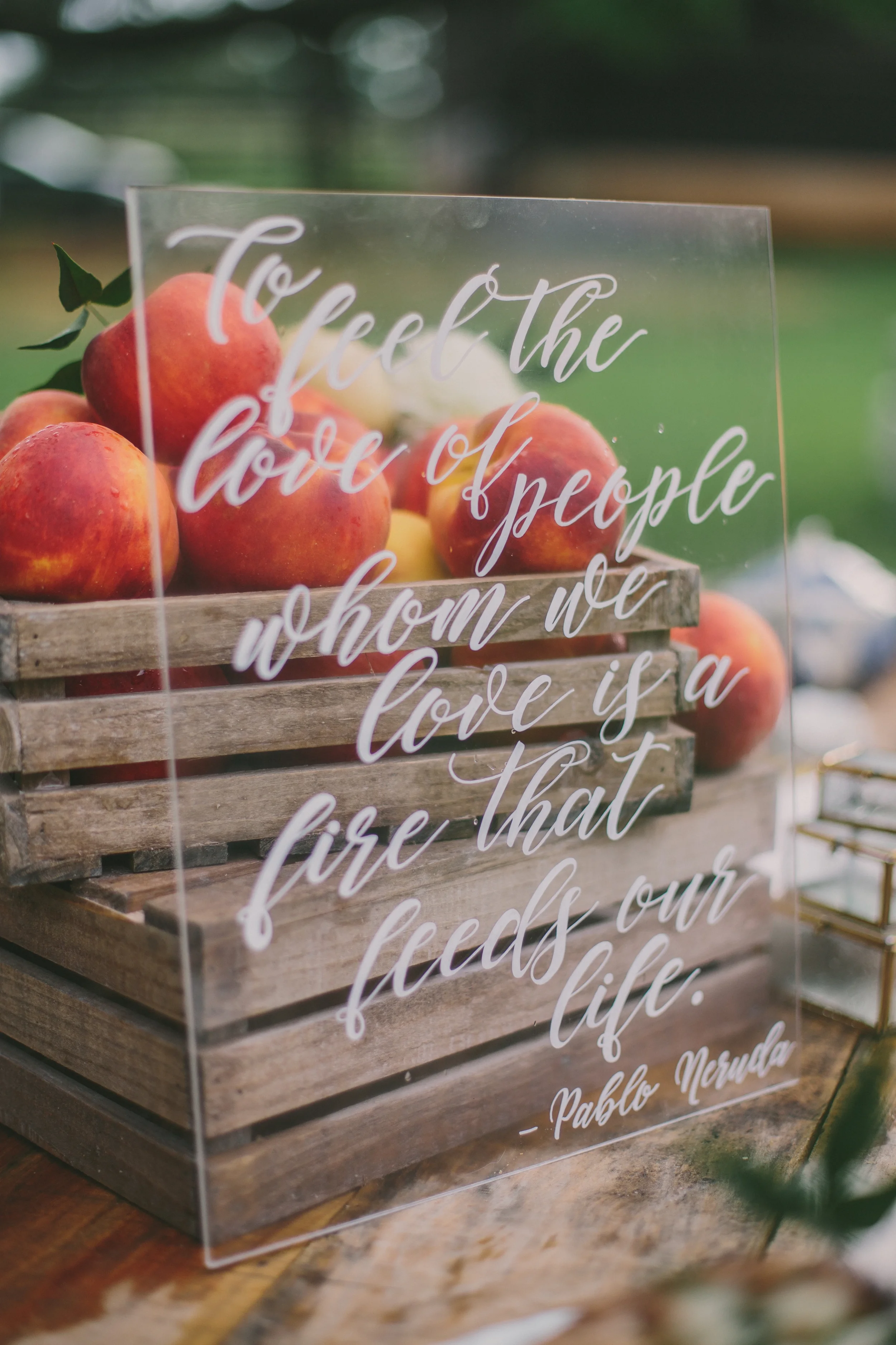 Custom clear acrylic wedding sign quote for outdoor southern reception table.