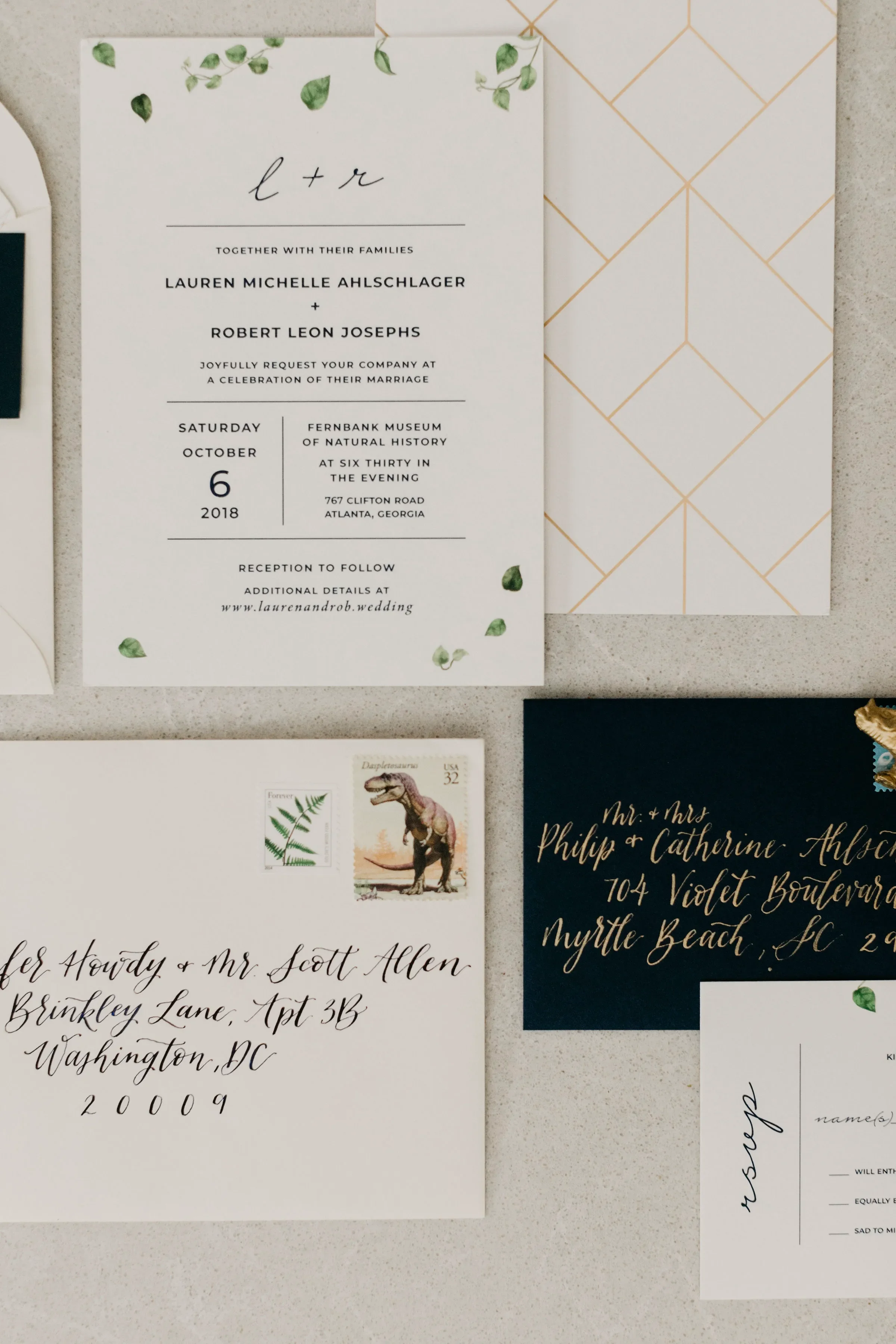 Balance modern organic details with high-end luxury in a minimalist botanical wedding invitation suite. This design juxtaposes crisp white cards adorned with clean green eucalyptus watercolor vines against an elegant geometric foil backing, rounded o