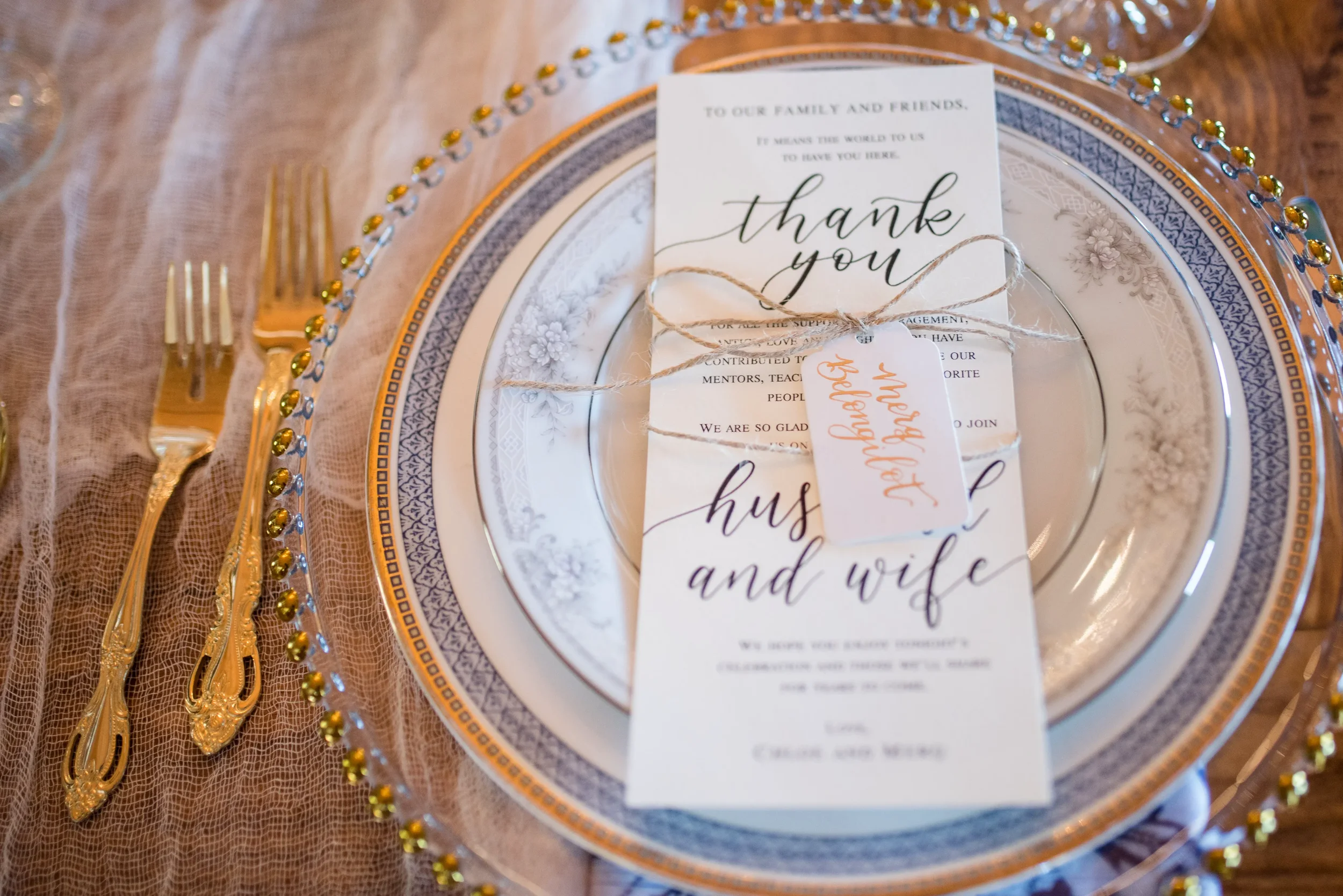 Elegant vintage style wedding place cards and calligraphed menus at a romantic Georgia reception.