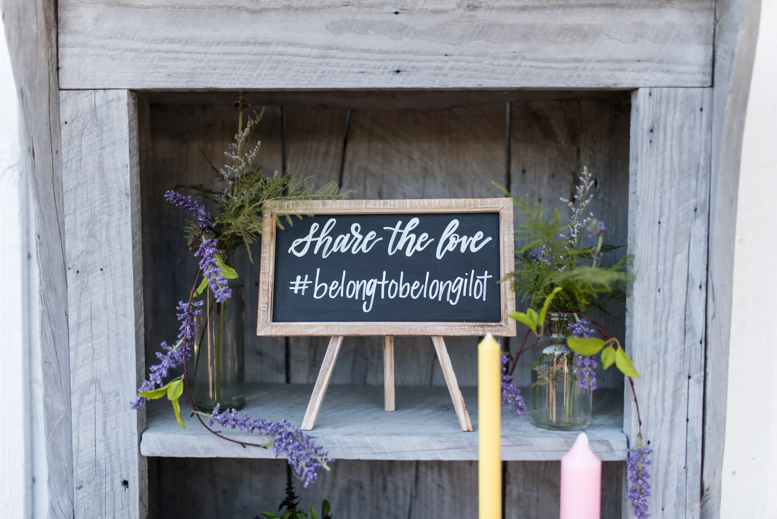 Hand-lettered hashtag chalkboard sign for a rustic outdoor wedding in Georgia.