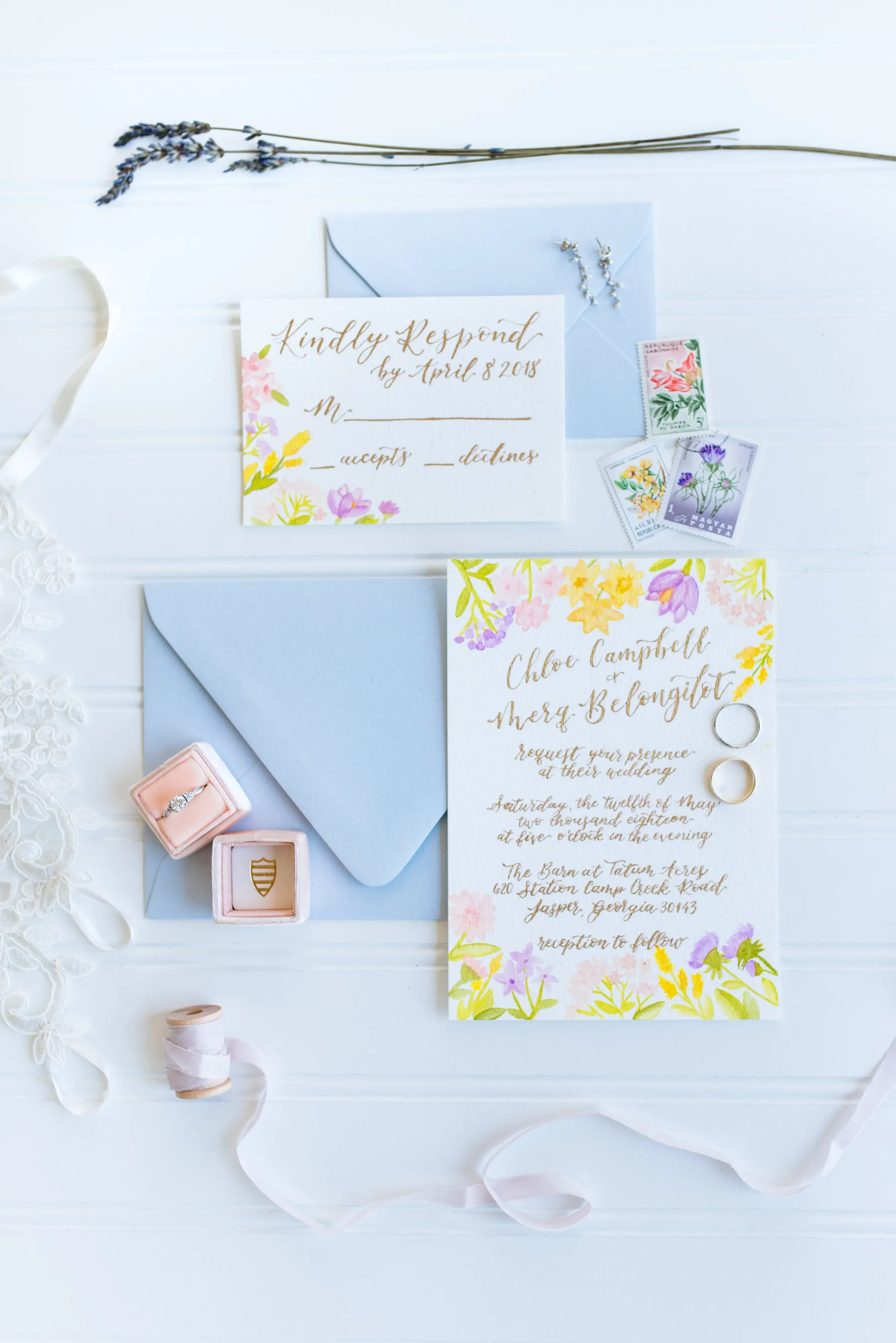 Beautifully styled invitation suites make for timeless keepsakes. This pastel watercolor wedding stationery is elegantly paired with a blush velvet ring box and delicate silk ribbon to showcase a gorgeous, cohesive day-of paper design.
