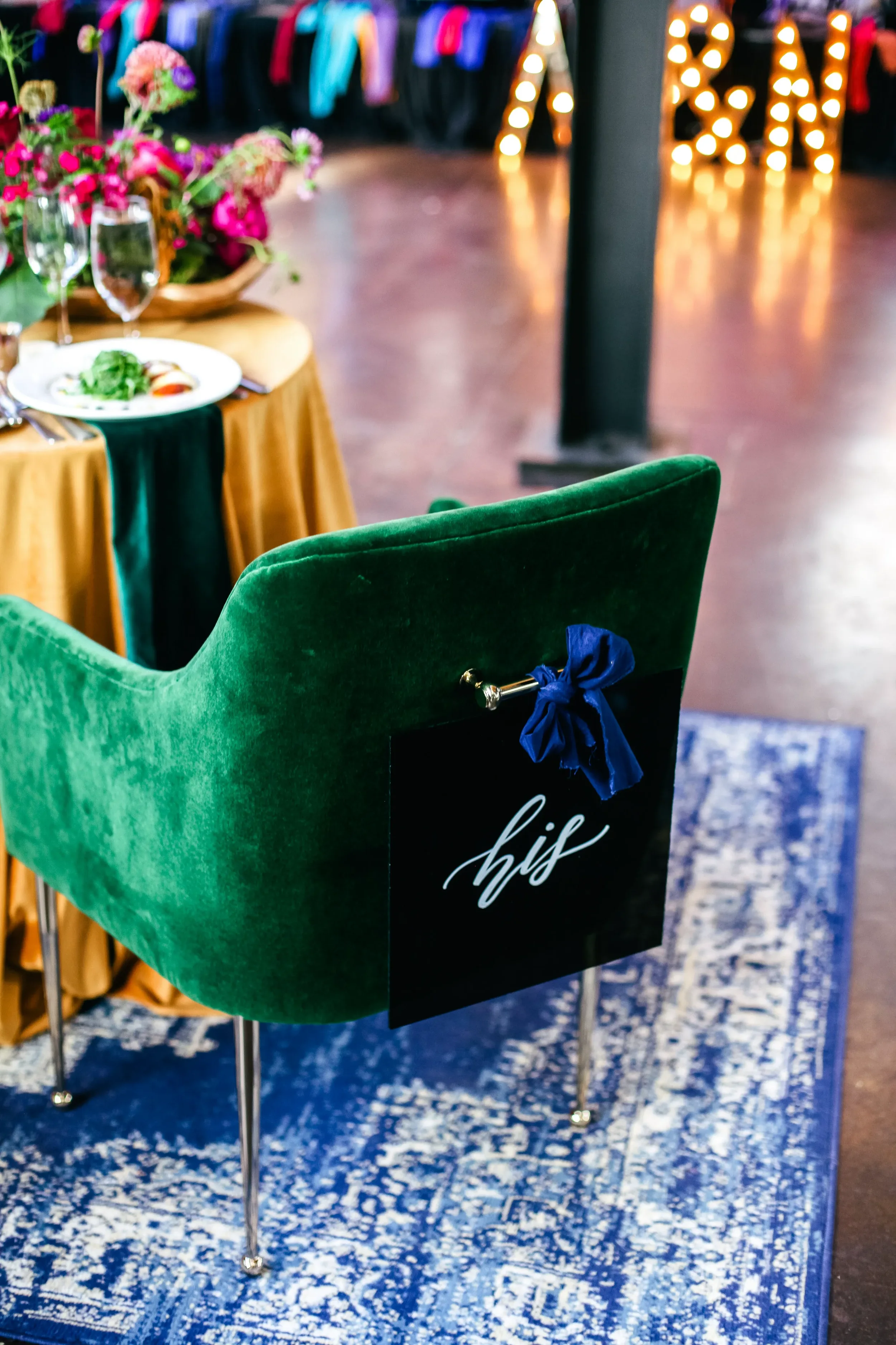 black-acrylic-sweetheart-table-chair-signs-wedding.webp