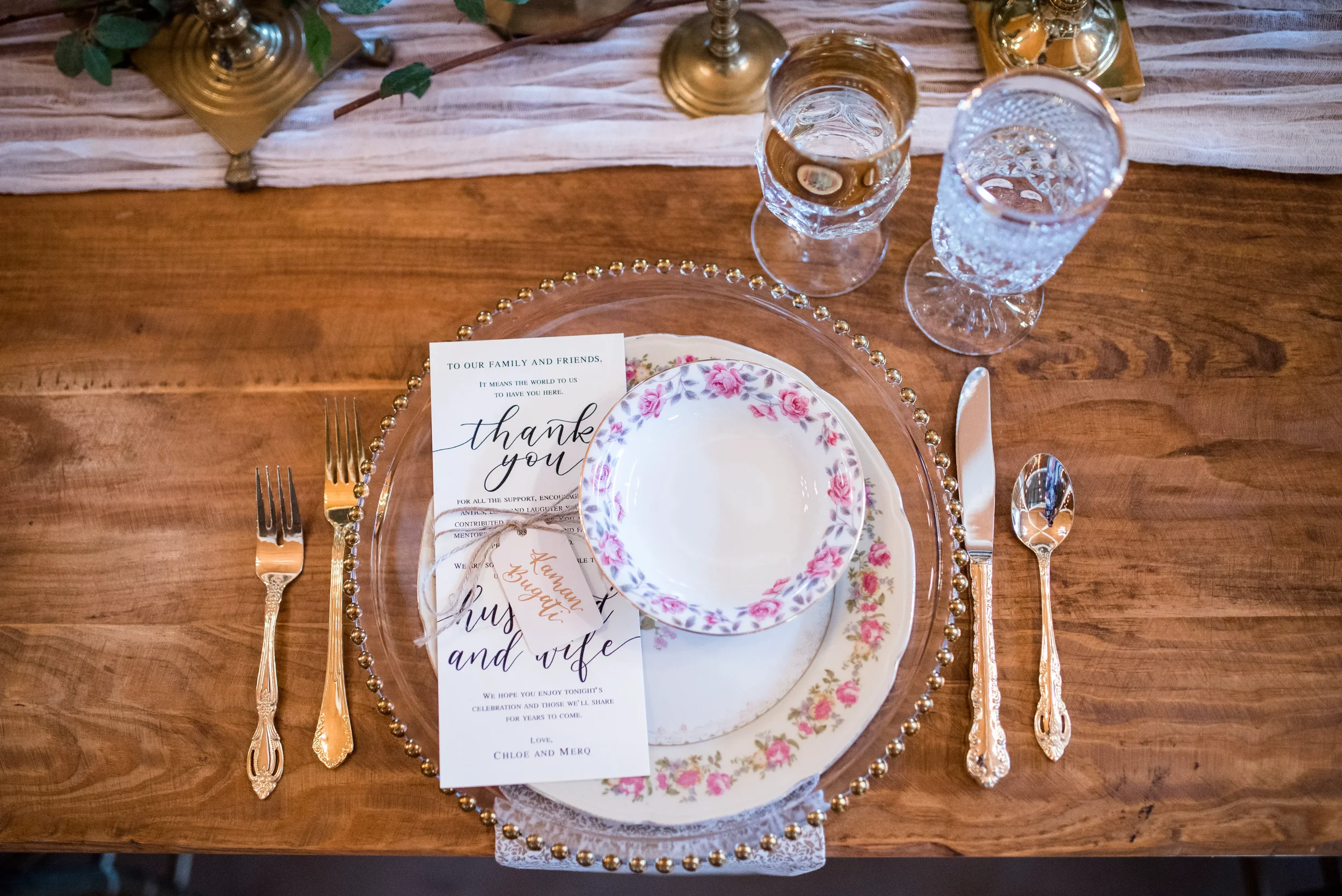 Infuse a sense of heirloom-quality elegance into your Georgia wedding day decor. Combining custom calligraphy place card tags, romantic typography, and antique-inspired floral porcelain, this fine art table styling setup sets a welcoming, luxurious t