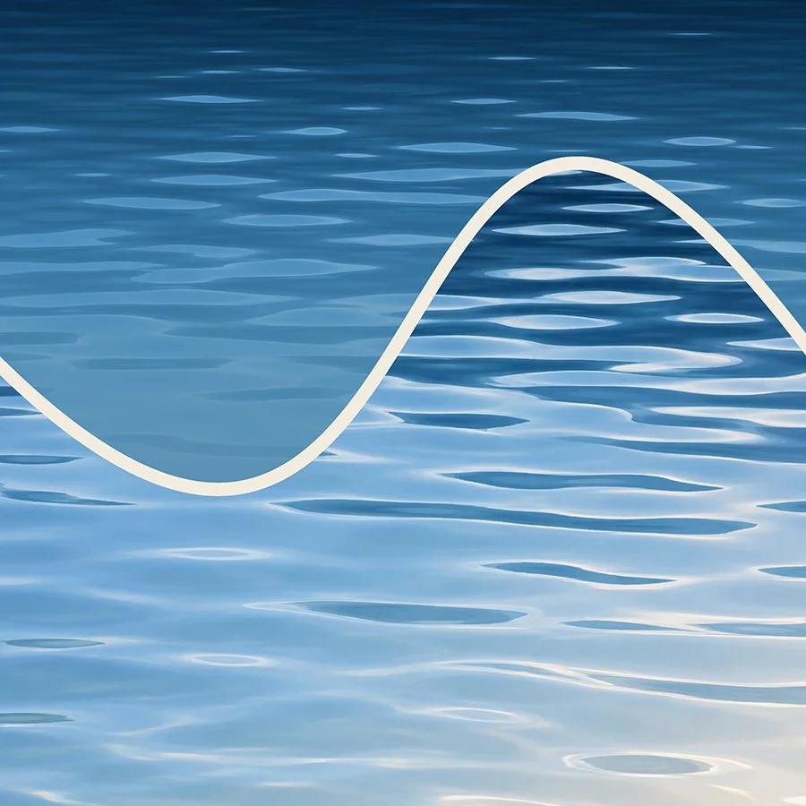 A digital illustration of a sine wave over a blue water background.