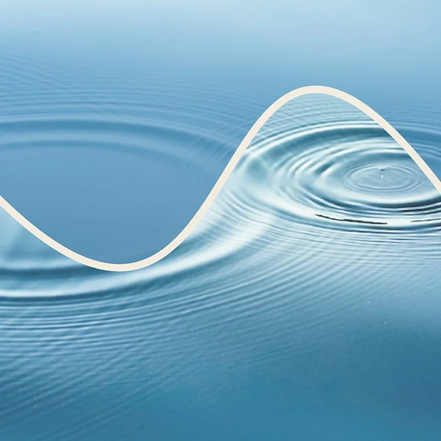 Abstract blue water ripple with a white wave outline.