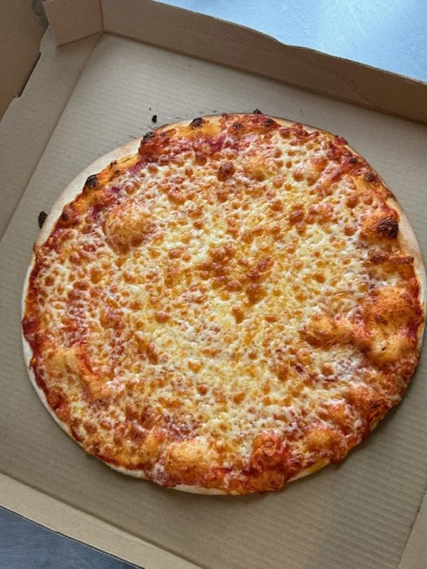 Cheese pizza in a cardboard box