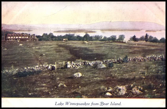 The above photo is from a postcard sent from the Bear Island Post Office on July 18, 1909. The photo is taken on the path that extends from Sunset Rock to the Hotel site. The Hotel is visible on the upper left. The path still goes through the break i