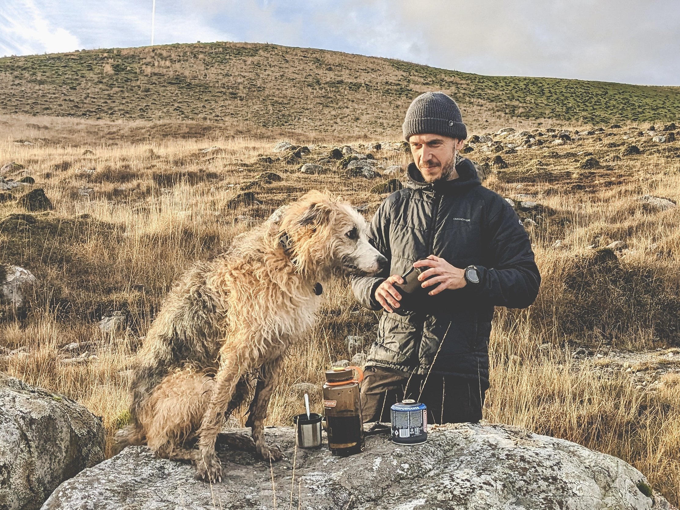 Image of Rhys and his dog enjoying the outdoors