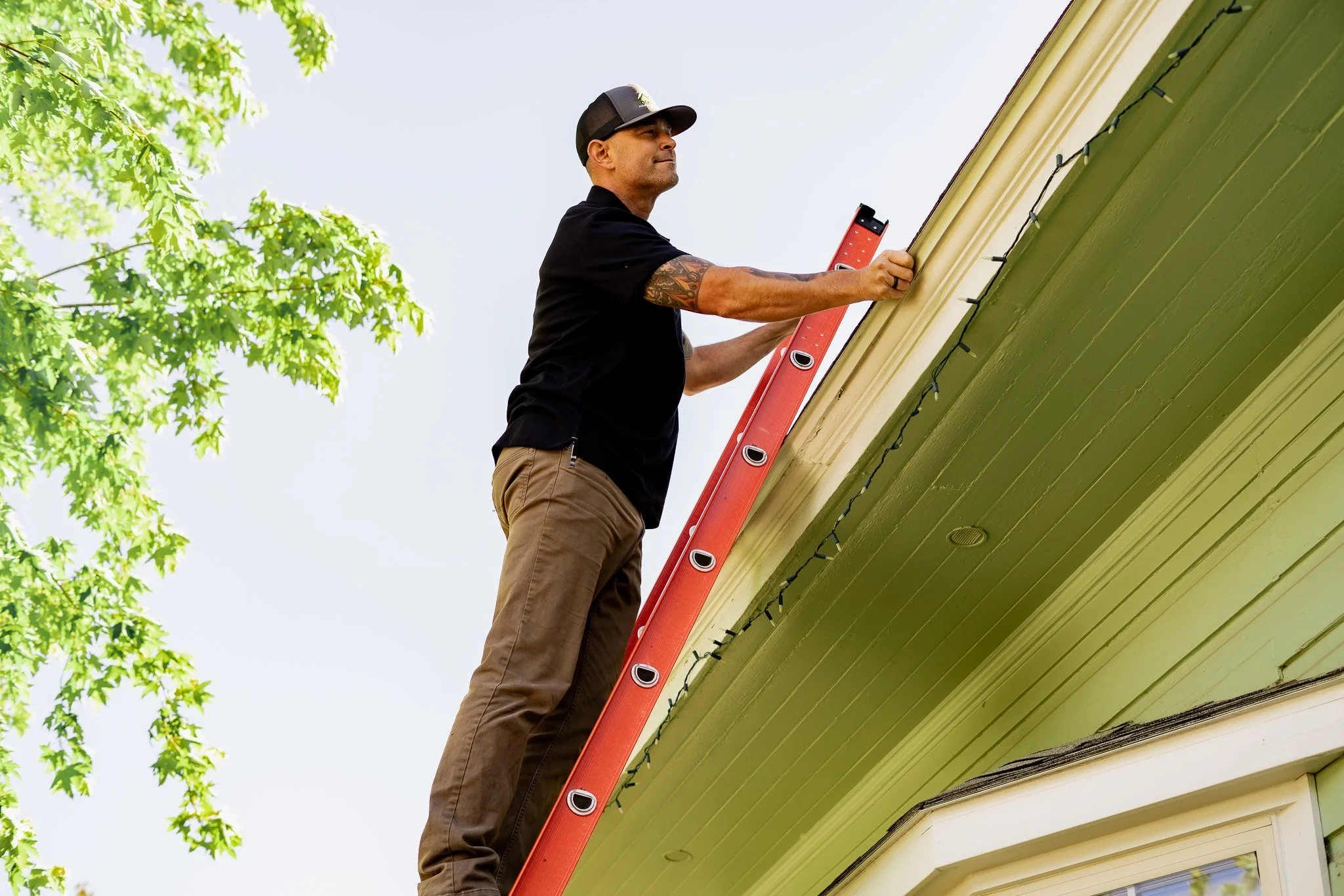 Home inspector, Sebastian Combes, inspects roof.