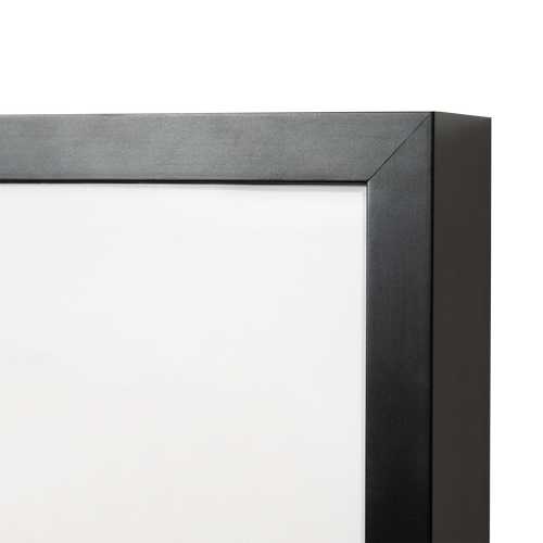 Close-up of a black cap frame with a white background.