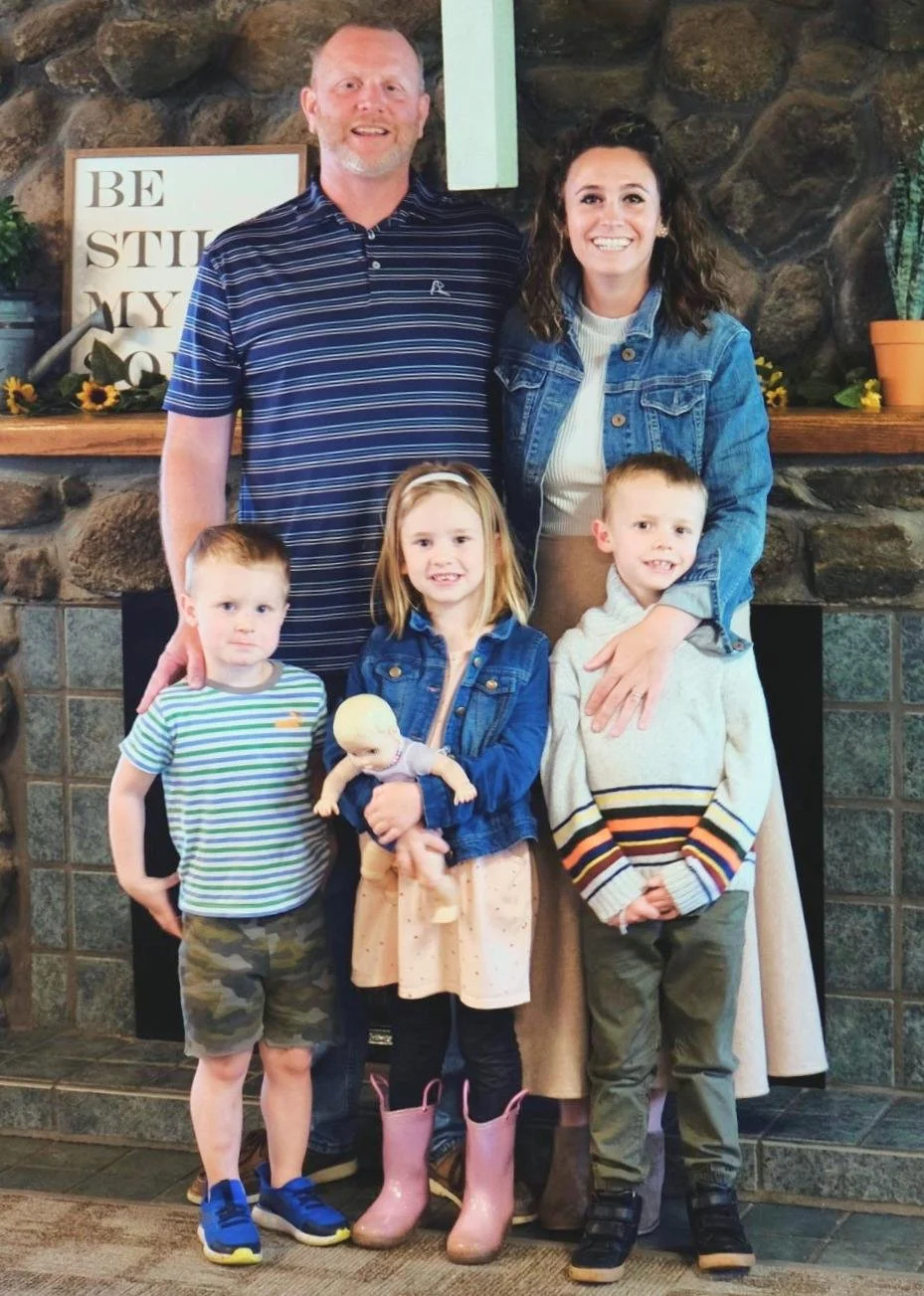 Noelle Jones with her husband and children