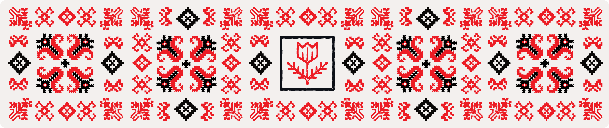 Horizontal pattern of traditional Ukrainian embroidery motifs in red and black on a white background, featuring geometric shapes and floral elements.