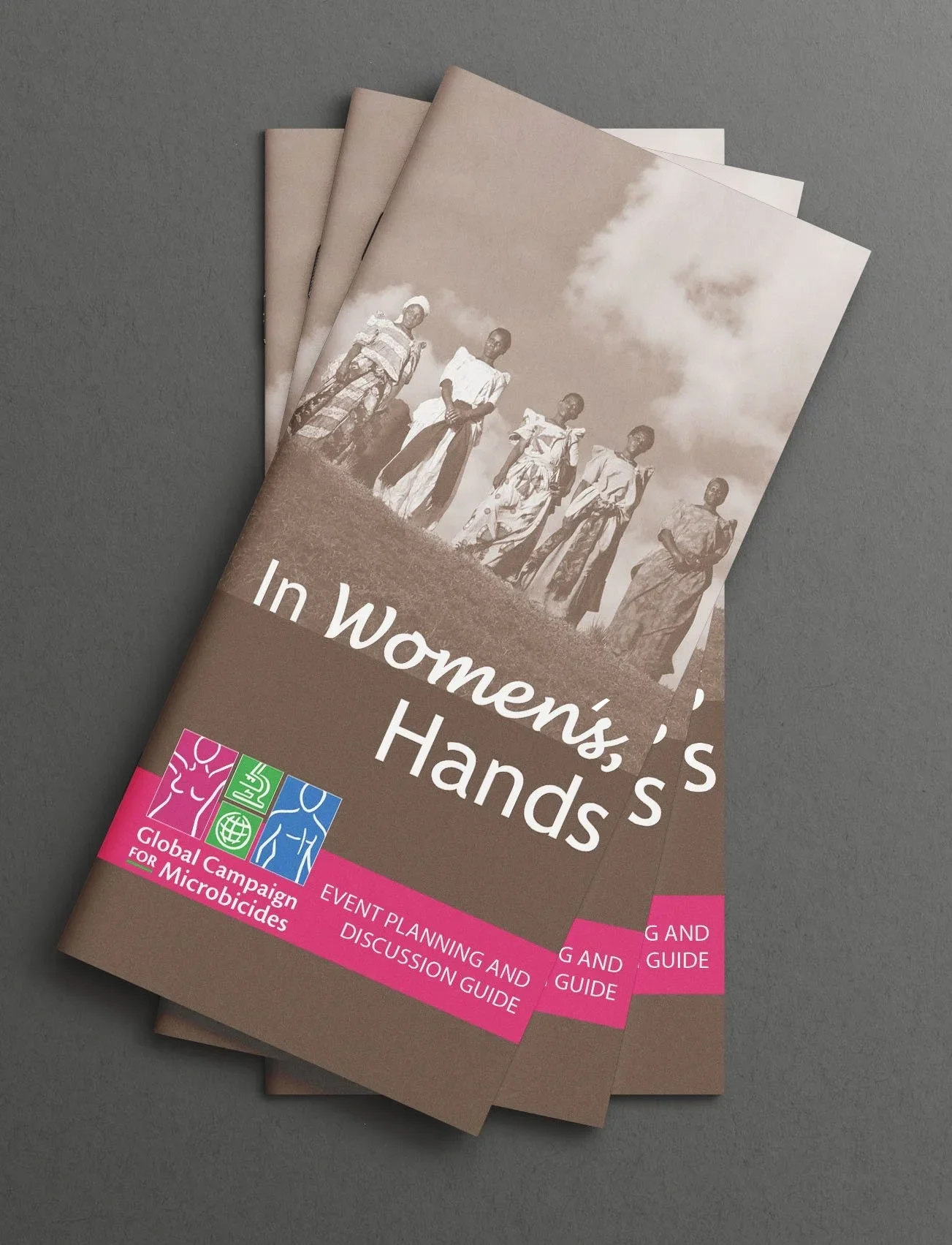 Brochure for a campaign about in women's hands with a black and white photo of four women standing outdoors against a cloudy sky. The brochure promotes a global campaign for microbicides, includes event planning and discussion guidelines, and features a colorful logo with the text "Global Campaign for Microbicides."