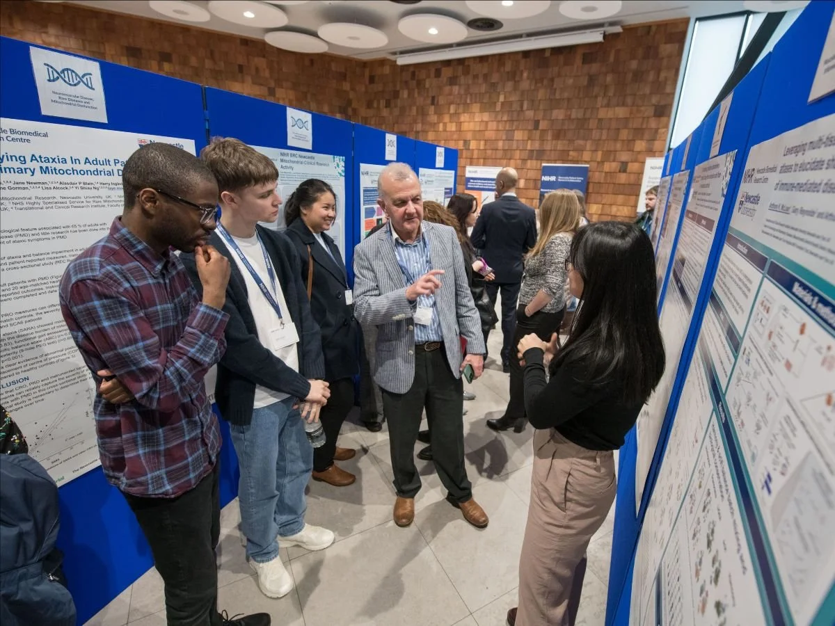 Anthony K. McLean, Jack F. Harrison, Professor John D. Issacs and Jasmine Sim