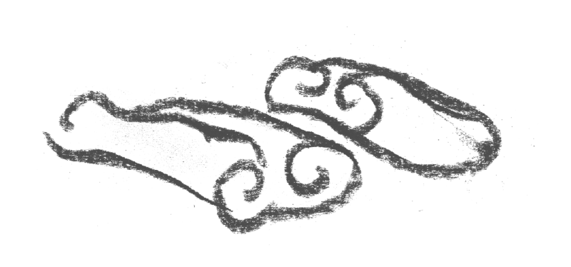 Two cinnamon sticks with decorative curly swirls
