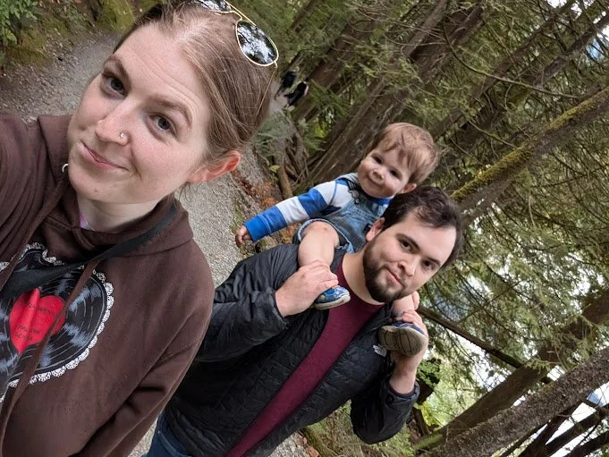 A family walk together in the forest