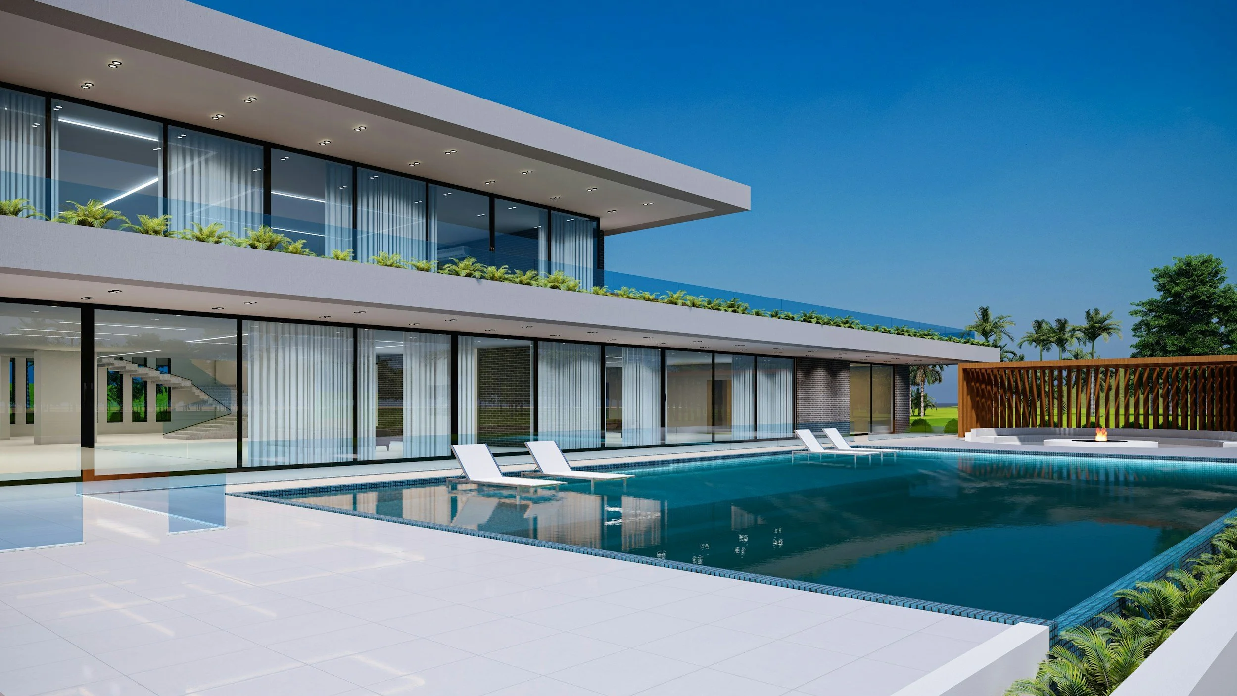 Modern two-story house with large glass windows, a swimming pool with lounge chairs, and a fire pit area, surrounded by palm trees under a clear blue sky.