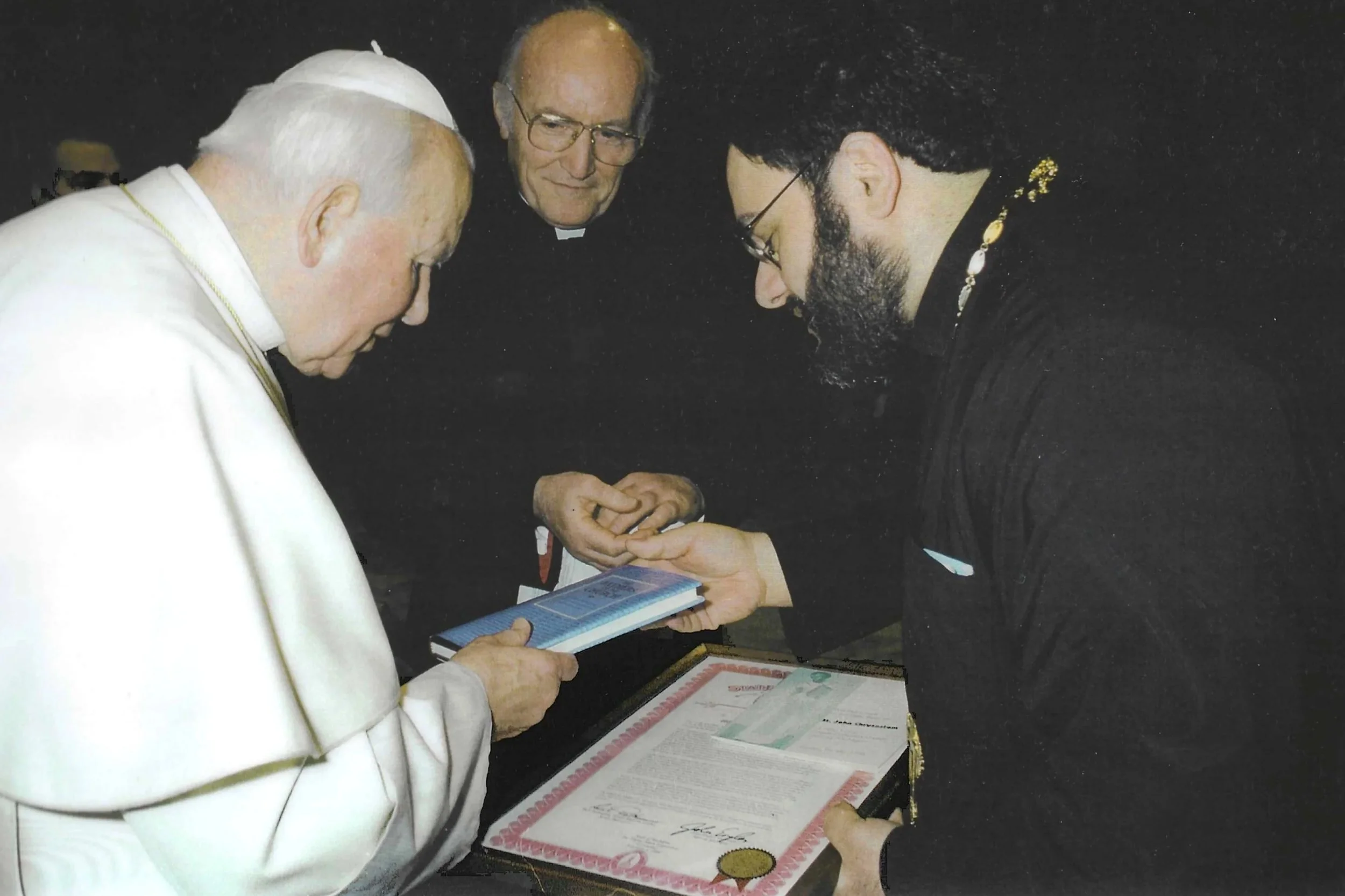 Presenting my publication St. John Chrysostom on Repentance and Almsgiving and a State of Michigan Special Tribute from Governor John Engler and State Senator Dick Posthumus to His Holiness Saint Pope John Paul II during a special audience in Rome, I