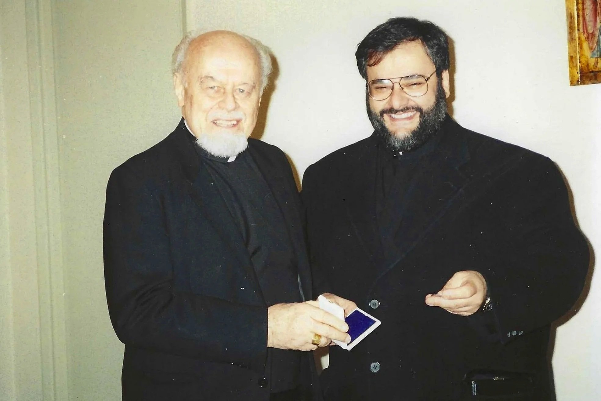 Receiving the Silver Medal from Monsignor Pierre Duprey, Secretary of the Pontifical Council for Promoting Christian Unity, in recognition of contributions to the Secretariat for Promoting Christian Unity during the nineteenth year of the Pontificate