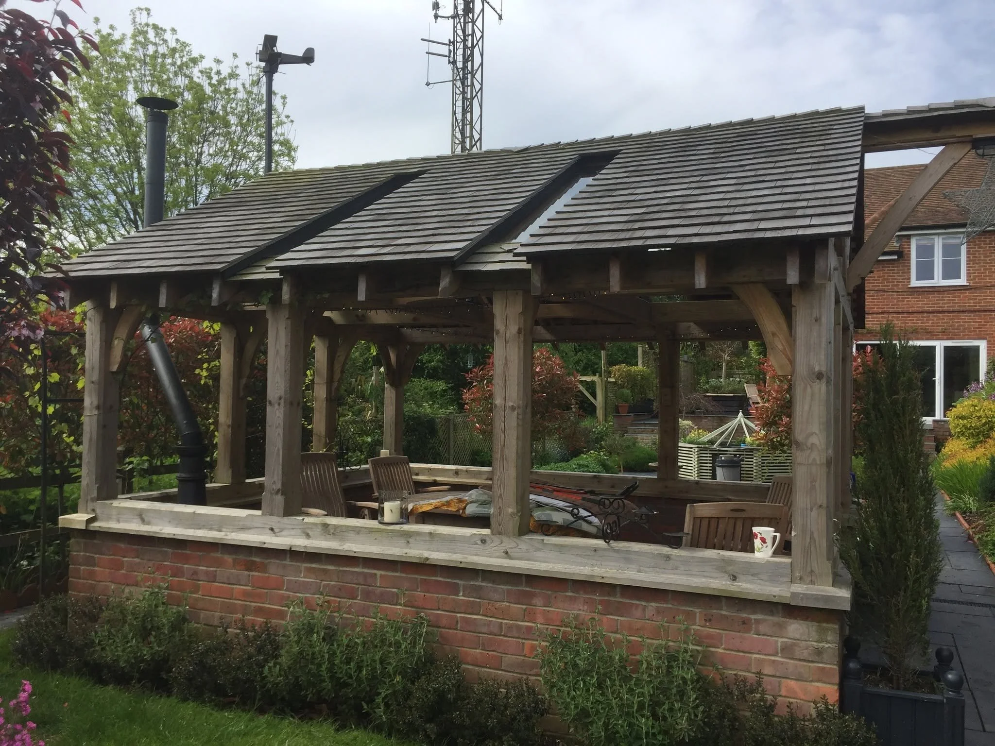 Elmwood Carpentry And Construction - Wooden Garden Structure With A Log Burner In