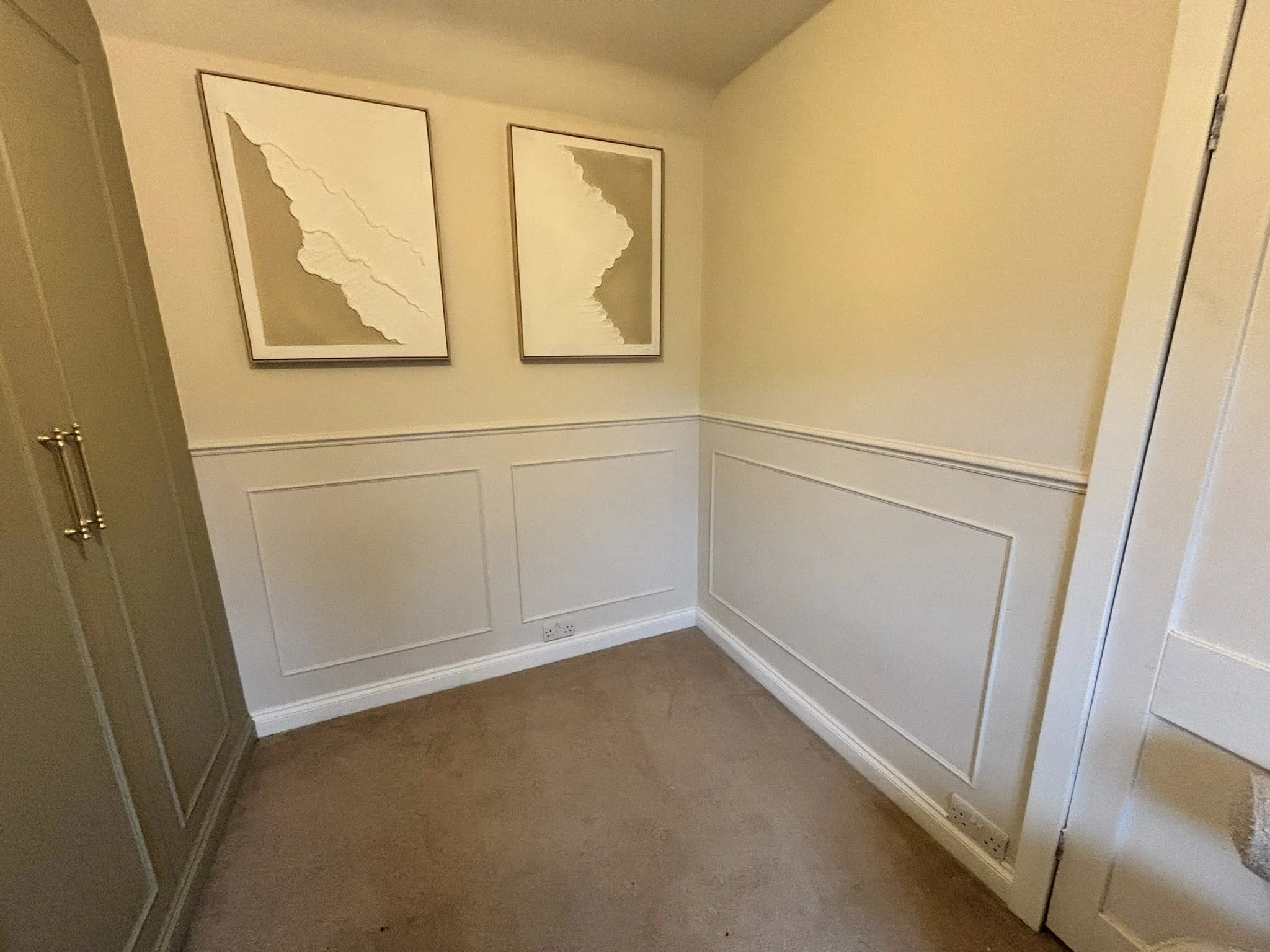Elmwood Carpentry And Construction - Wood Panelling On A Wall In Cream
