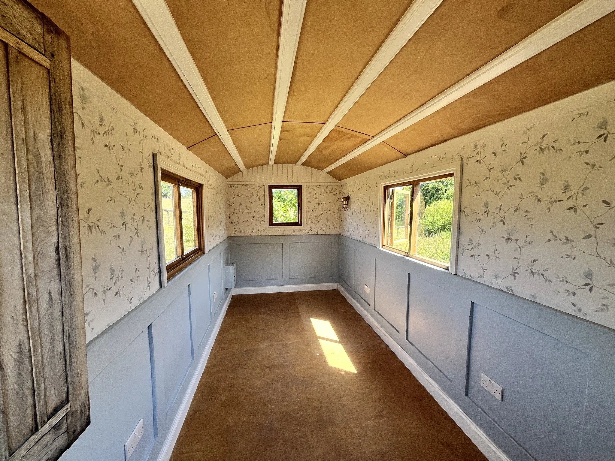 Elmwood Carpentry And Construction - Wooden Shepherds Hut Inside Blue Wood Panelling