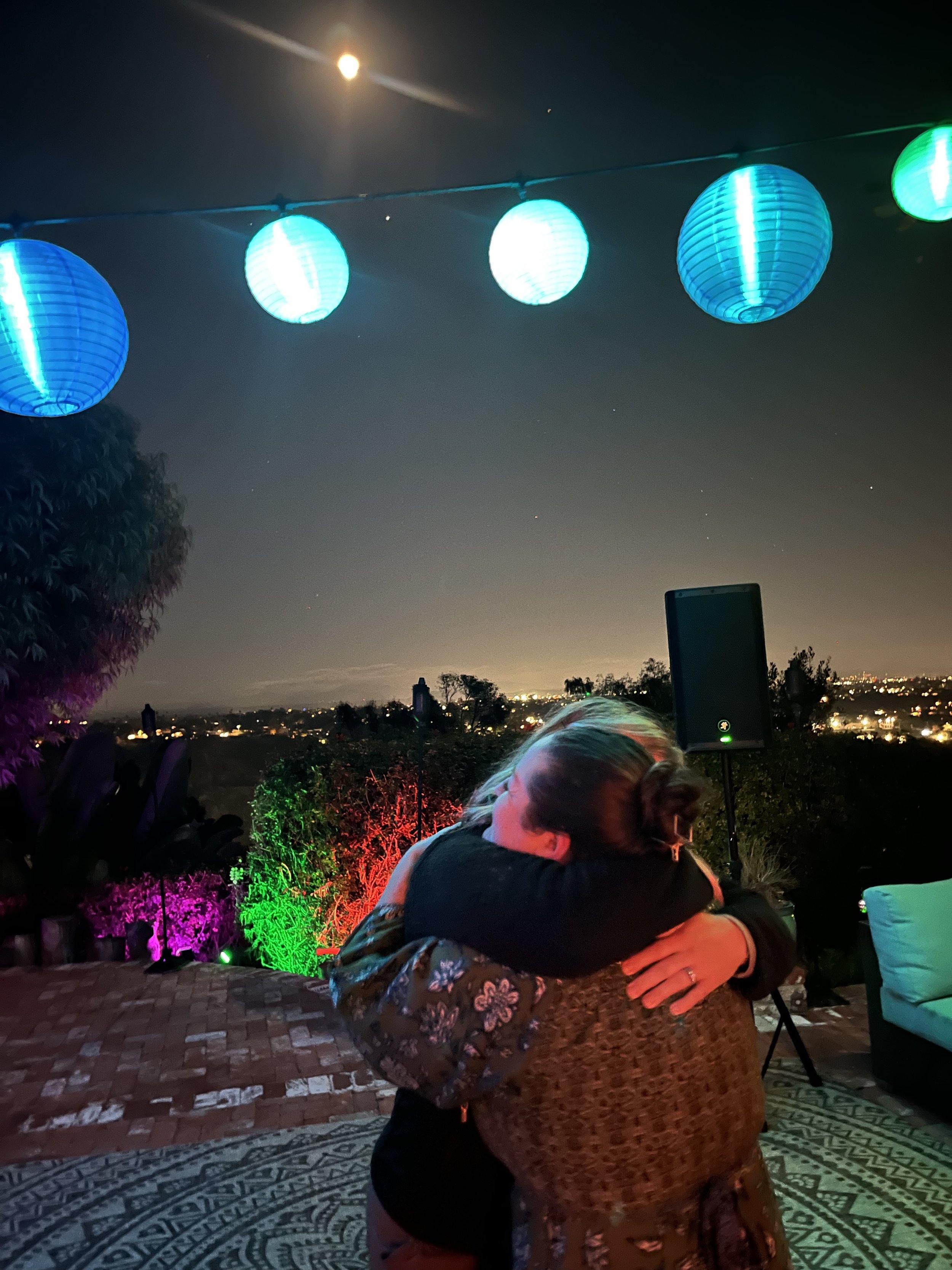 Two women who became friends at a circle honoring their connection.