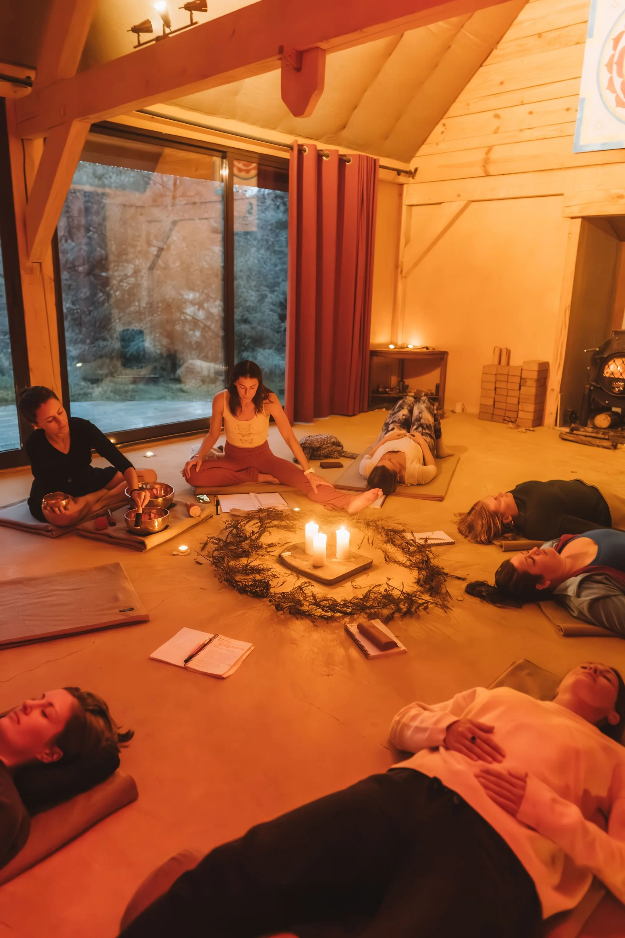 Claire guiding women through a meditation during a circle as part of a women's retreat.