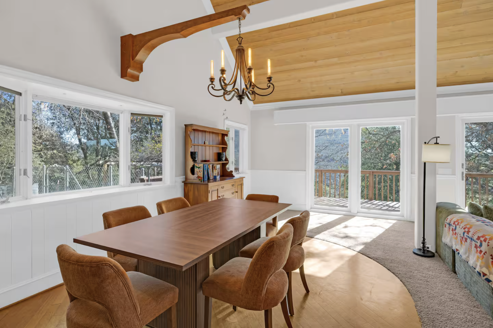 Dining area with view of the woods at retreat venue.