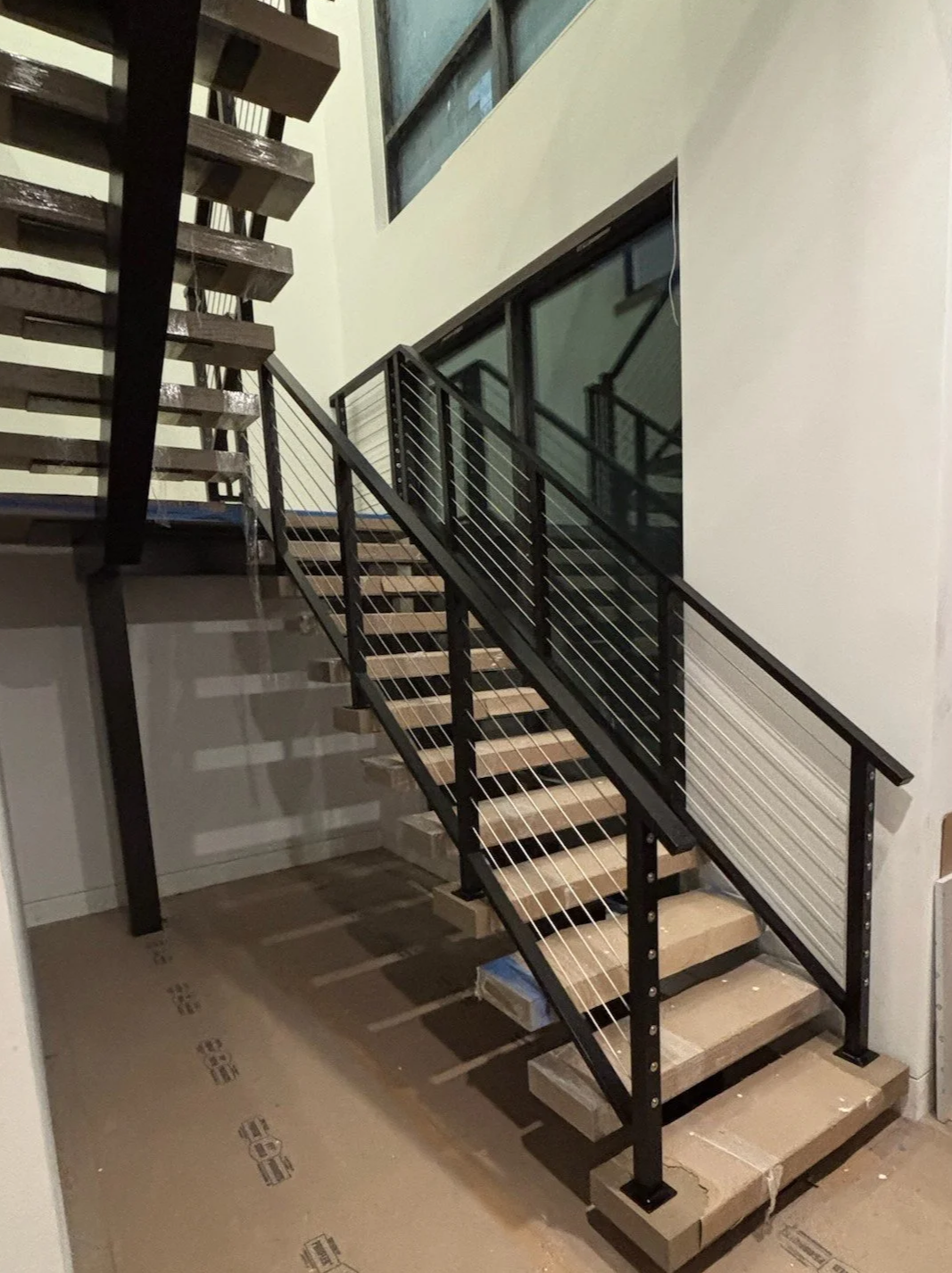 Cable railing interior home fabricated by APG Welding
