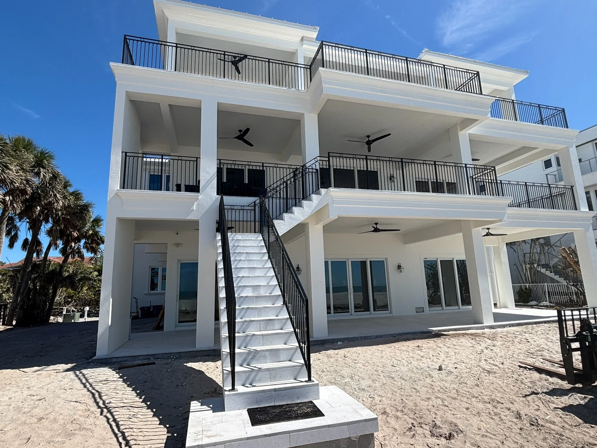 Custom aluminum railings Sarasota Luxury waterfront home fabricated by APG Welding.