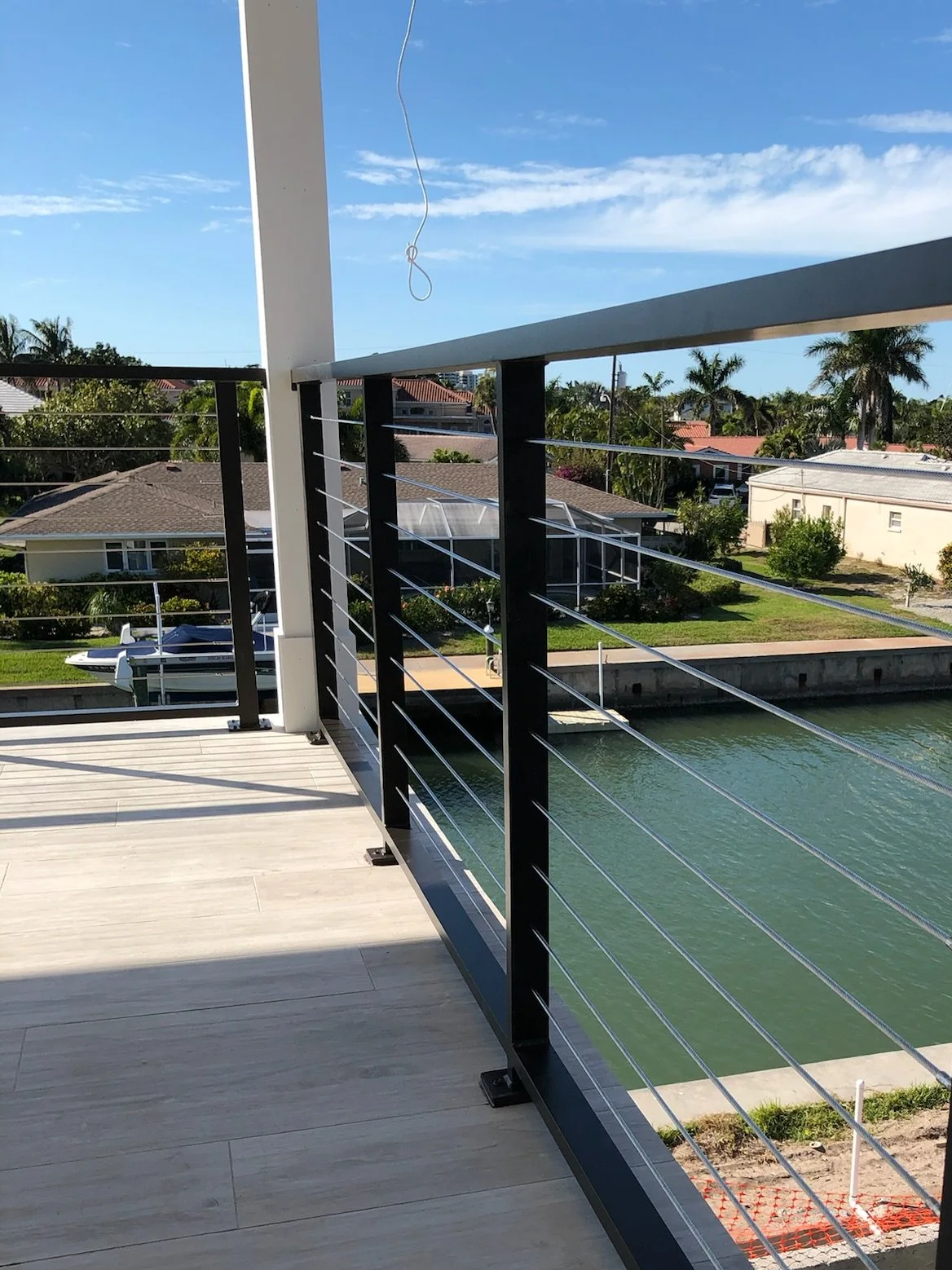 Cable railing Sarasota waterfront home overlooking canal