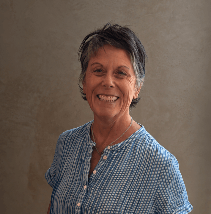 Woman in grey blue top Julie Simpson