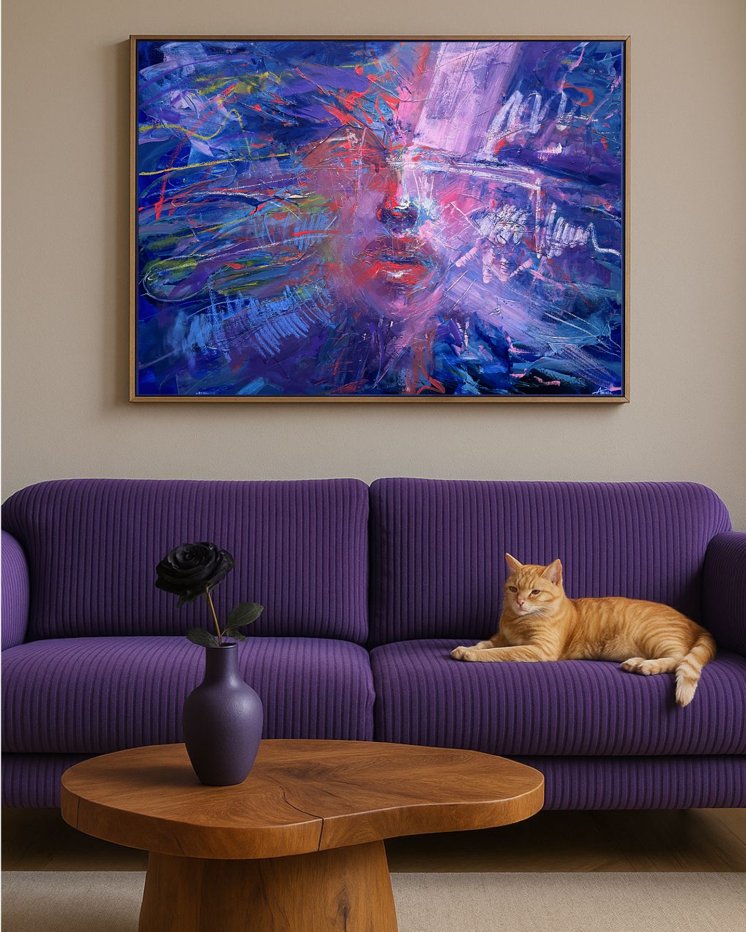 Orange tabby cat lounging on a purple sofa beneath an abstract blue and purple painting, with a black rose in a vase on a wooden coffee table.