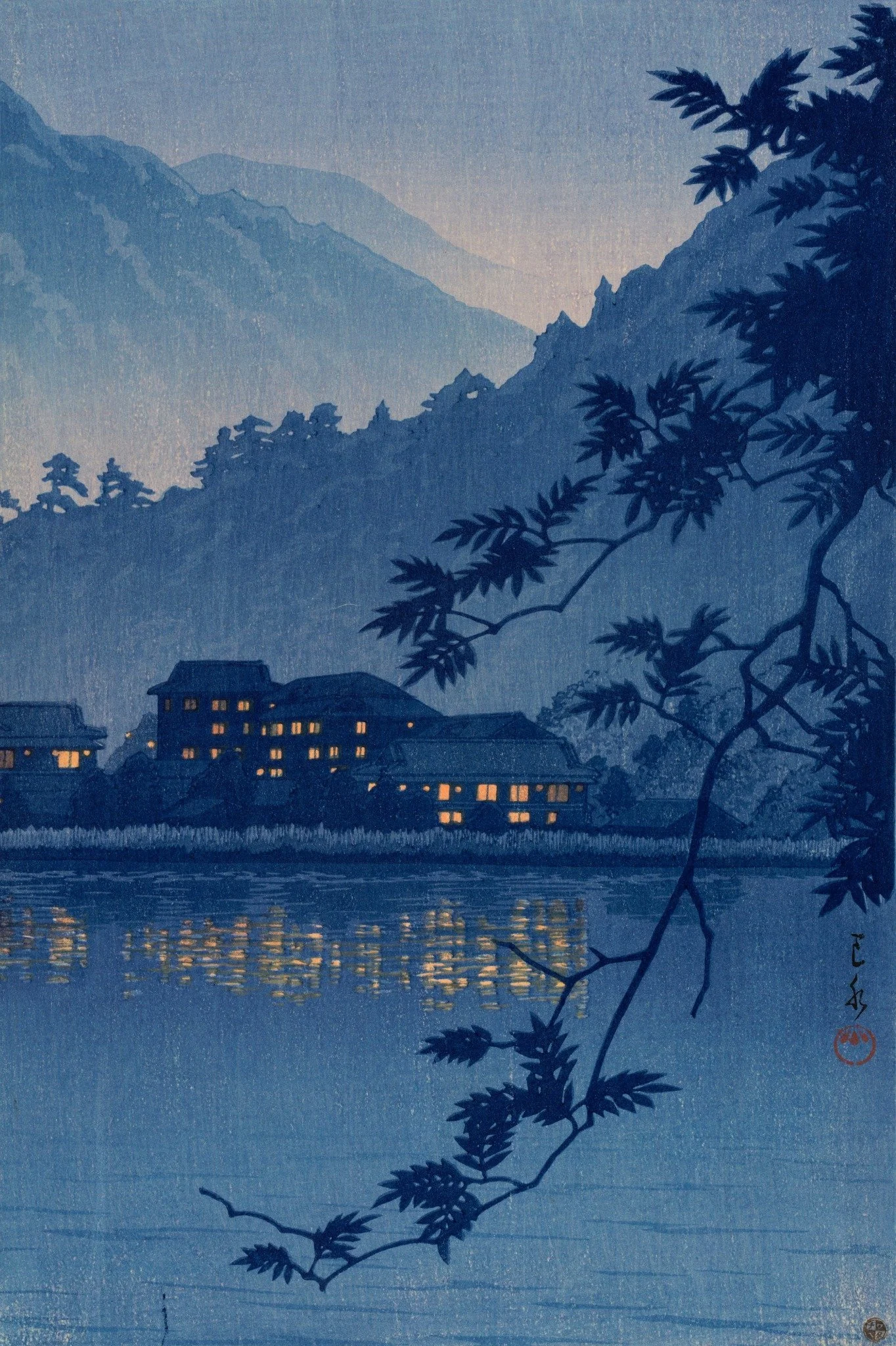 Yumoto Spa, Nikkō by Kawase Hasui: Warmly lit inns and golden reflections glow against still blue water, layered mountain silhouettes and a dark arching branch.
