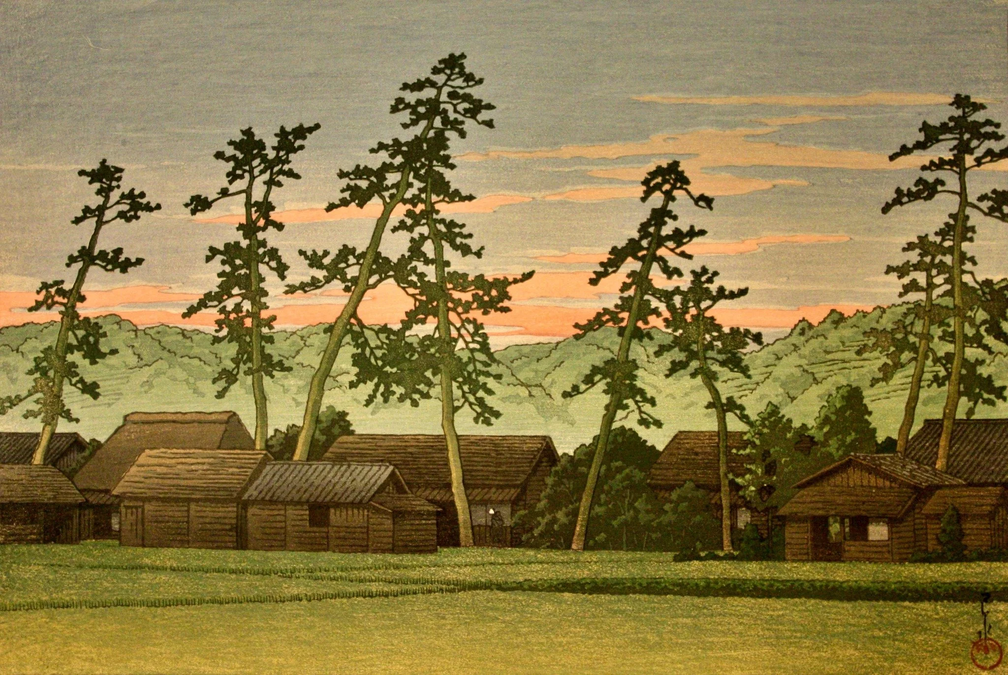 Shimada on the Tōkaidō Road by Kawase Hasui: Tall, irregular pines rise above wooden village roofs and green fields beneath a muted peach evening sky.